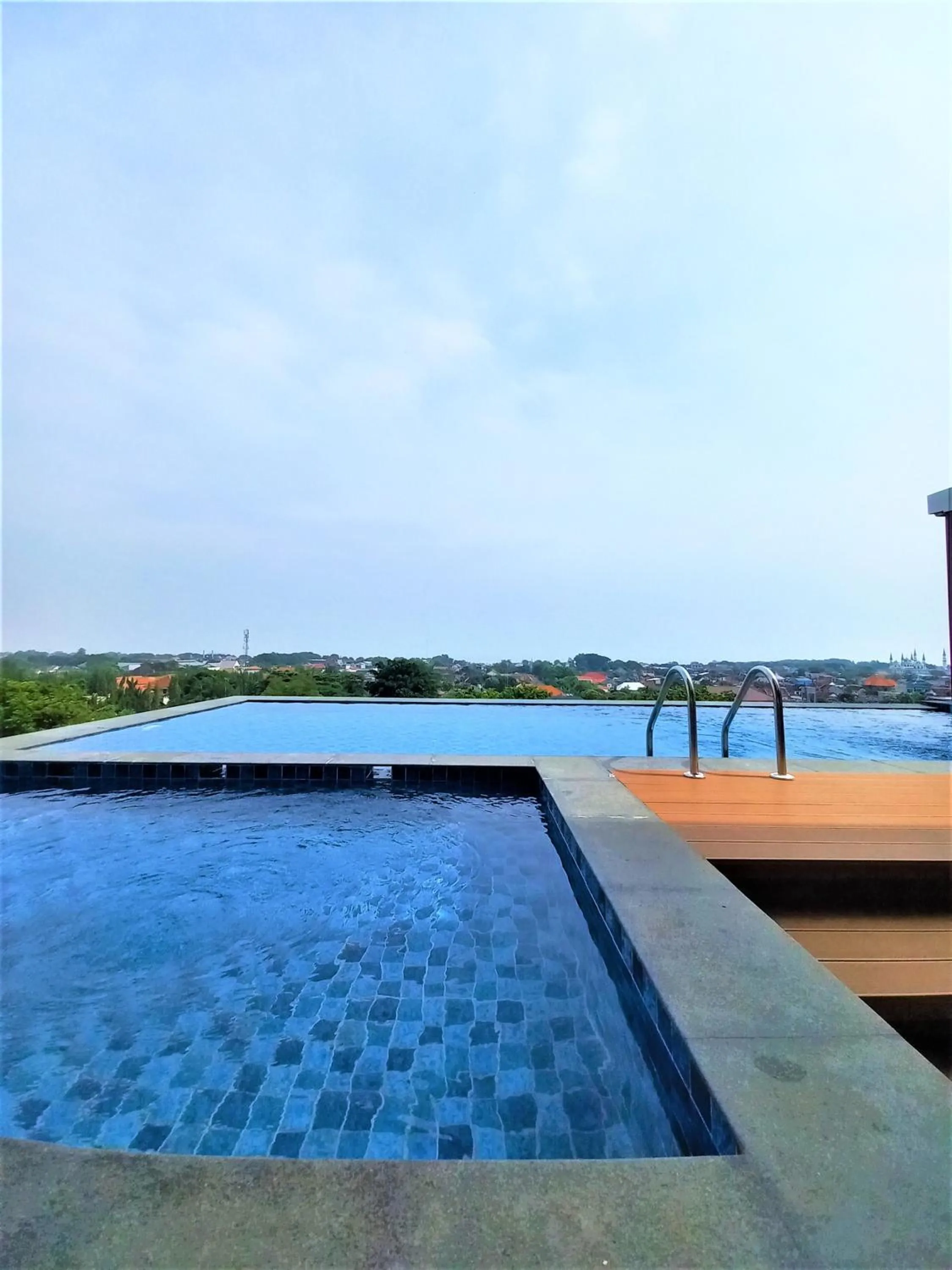 Swimming pool in Front One King Hotel Tuban
