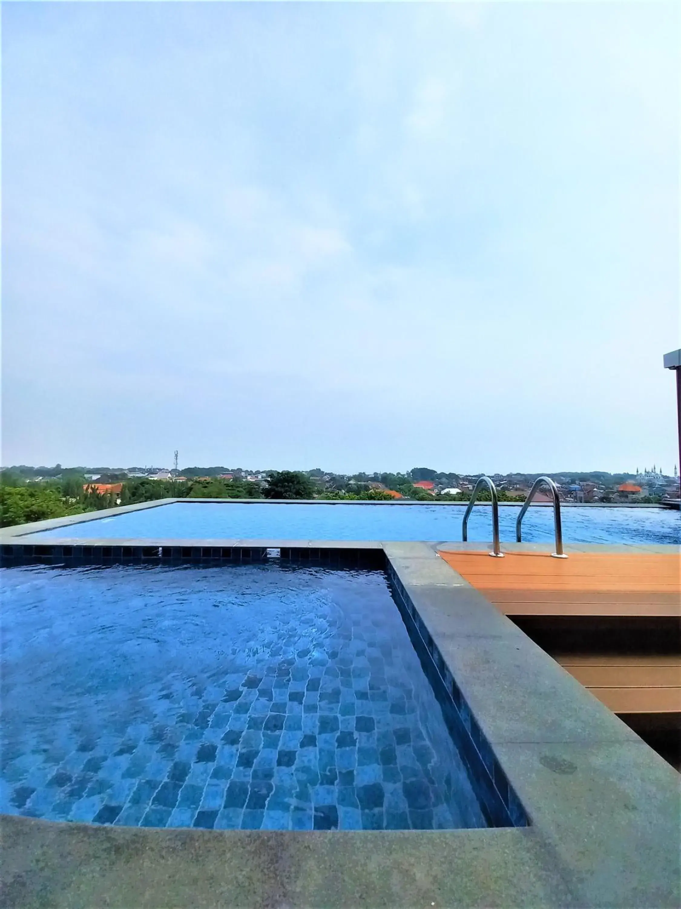 Swimming pool in Front One King Hotel Tuban Swimming pool in Front One King Hotel Tuban