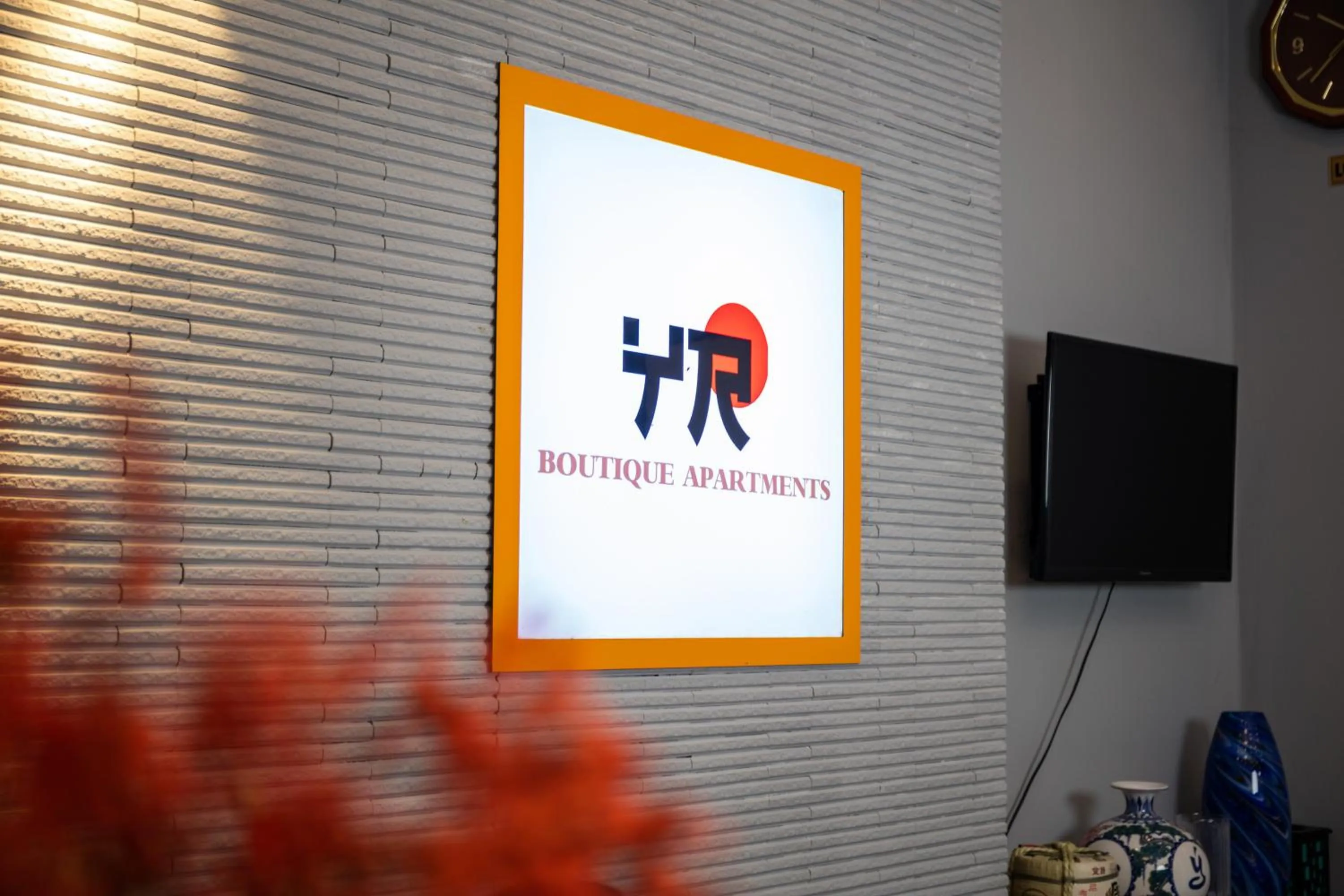 Logo/Certificate/Sign in YR Hotel & Apartments