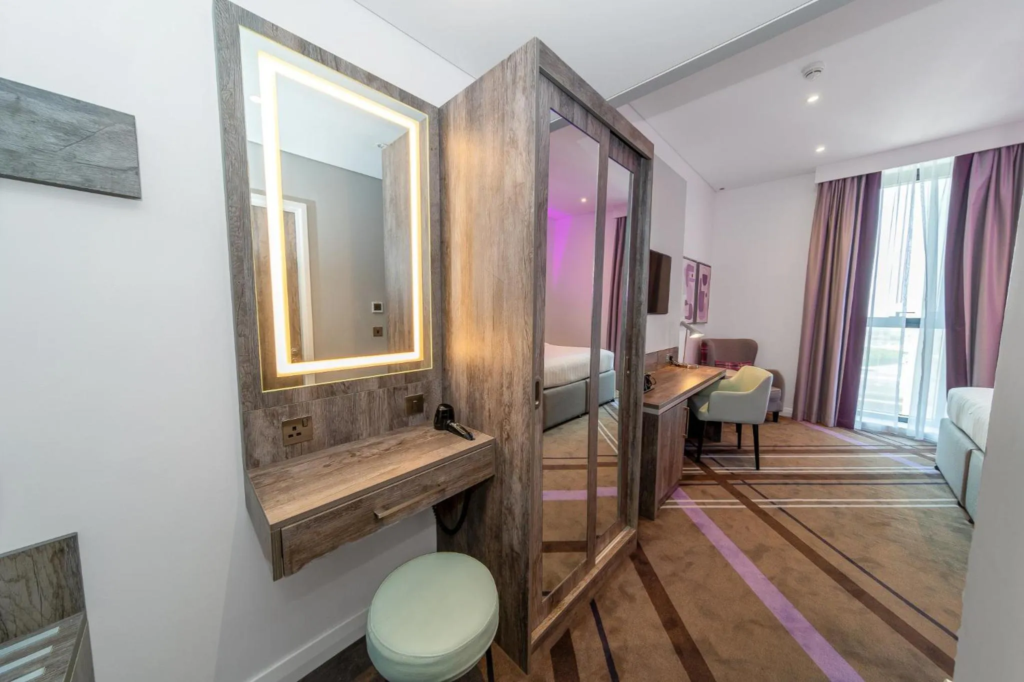 Seating area, Bed in Premier Inn Dubai Barsha Heights