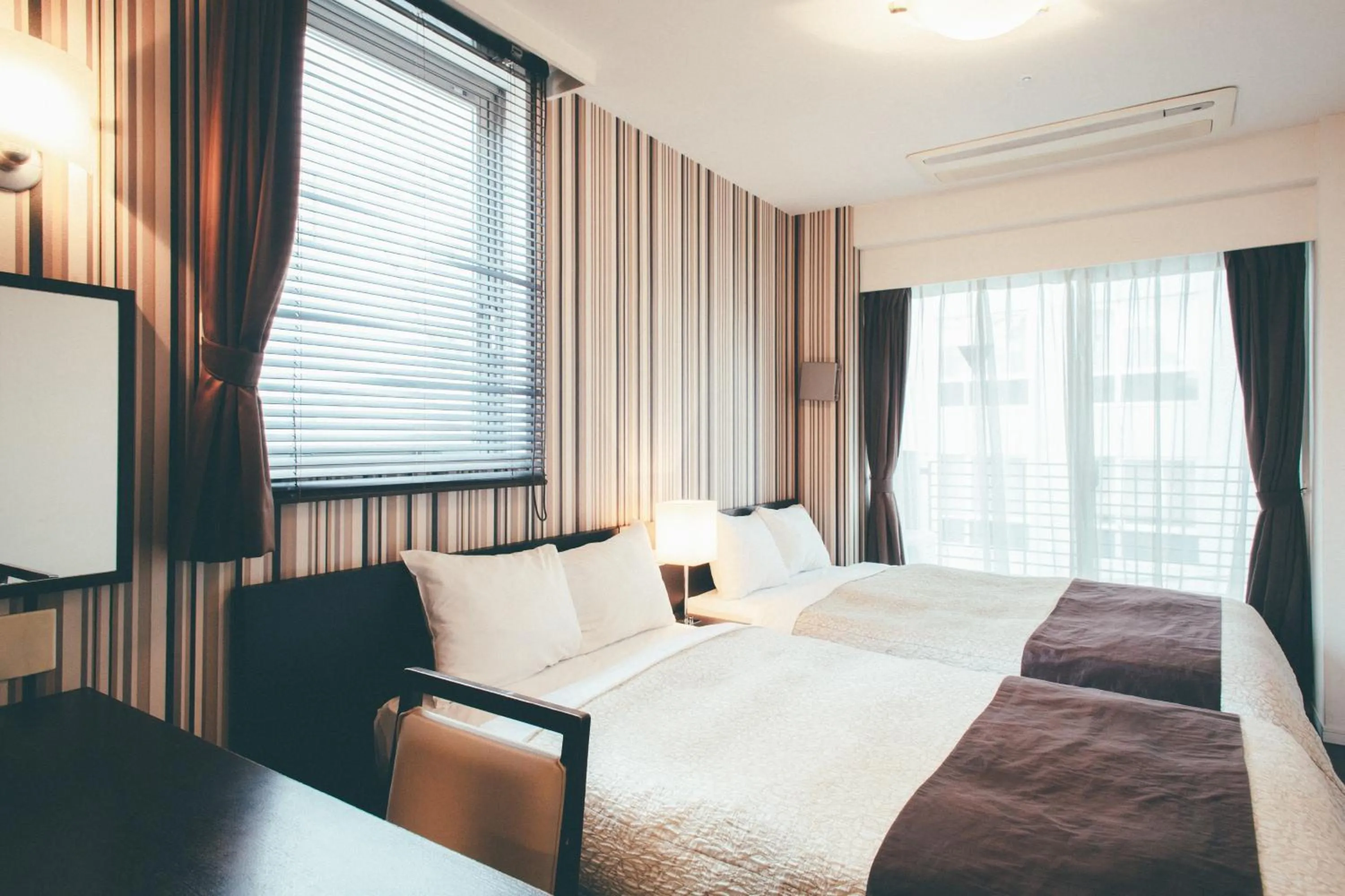 Bed in Kuretake Inn Premium Hamamatsucho