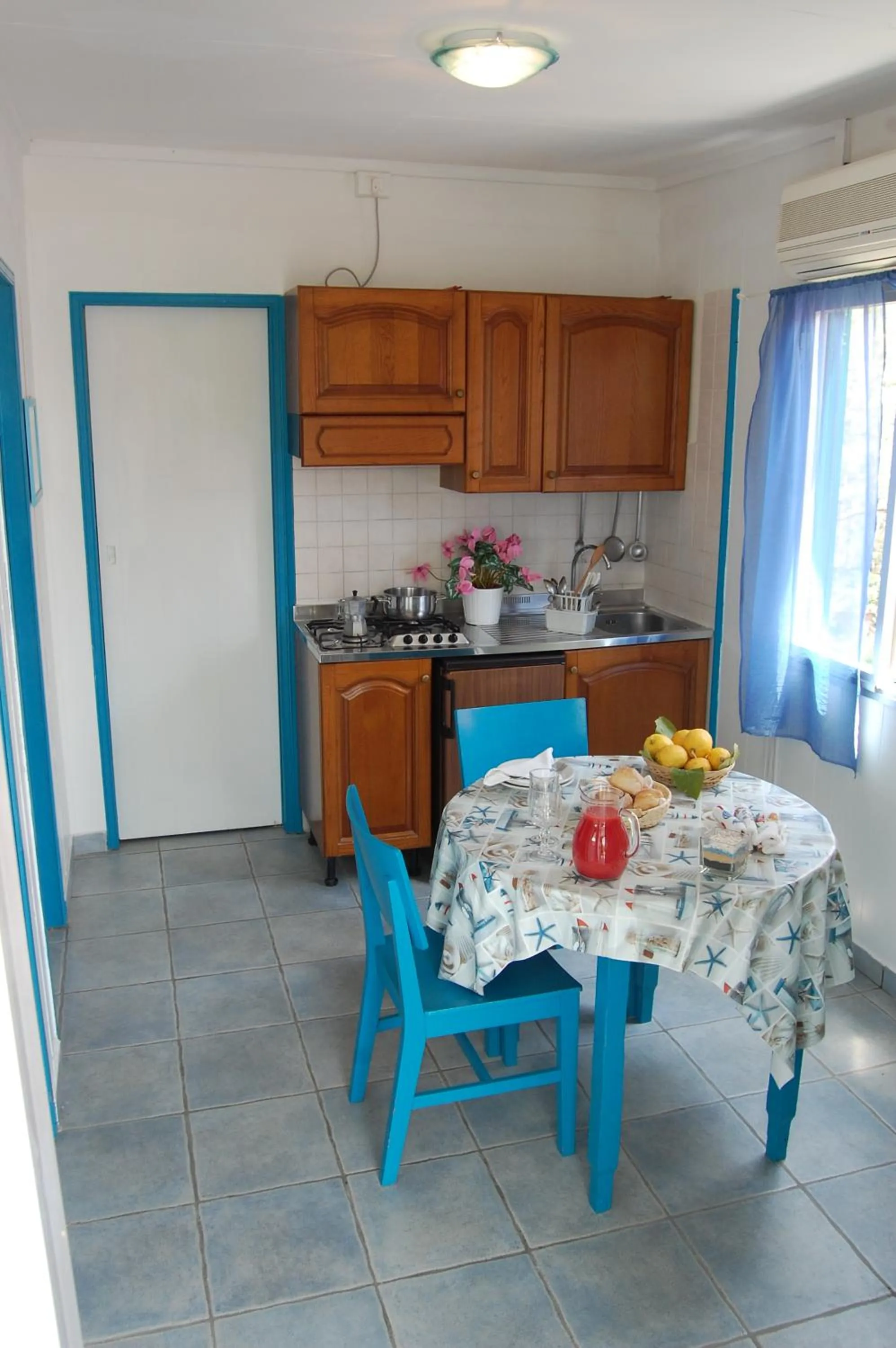 Kitchen or kitchenette in Villaggio Residence Nettuno