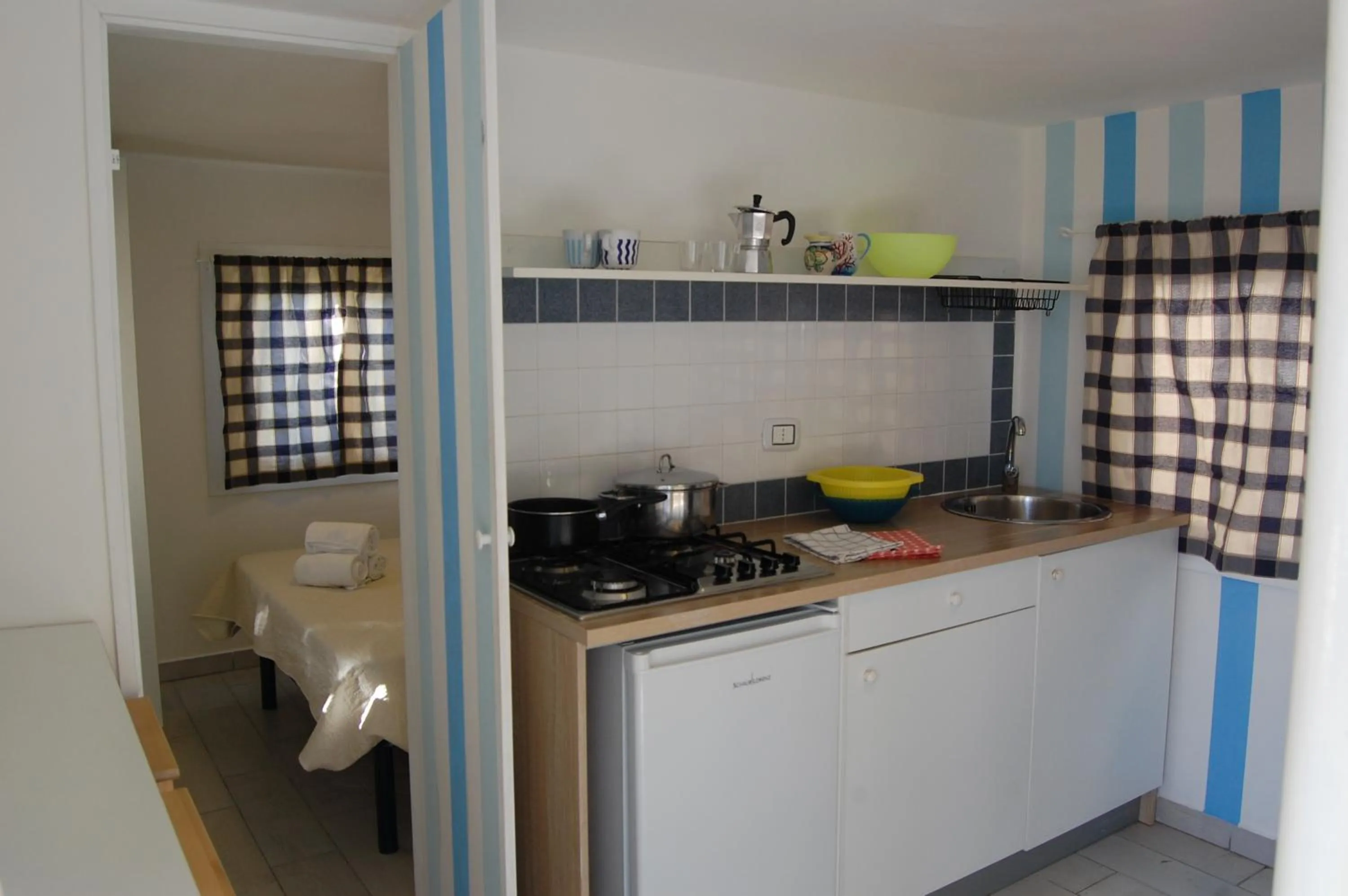 Kitchen or kitchenette in Villaggio Residence Nettuno