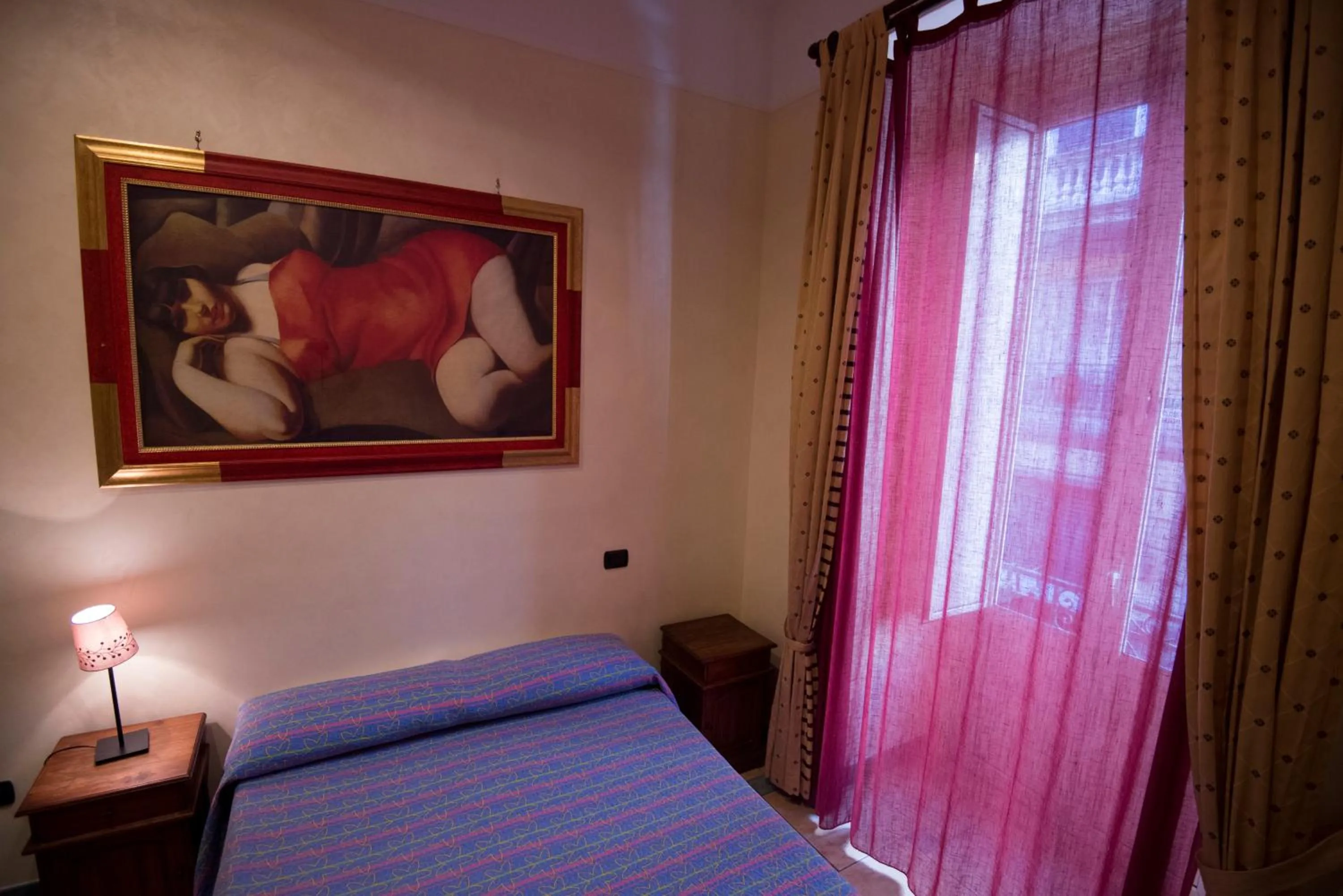 Bed in Schilizzi Hotel