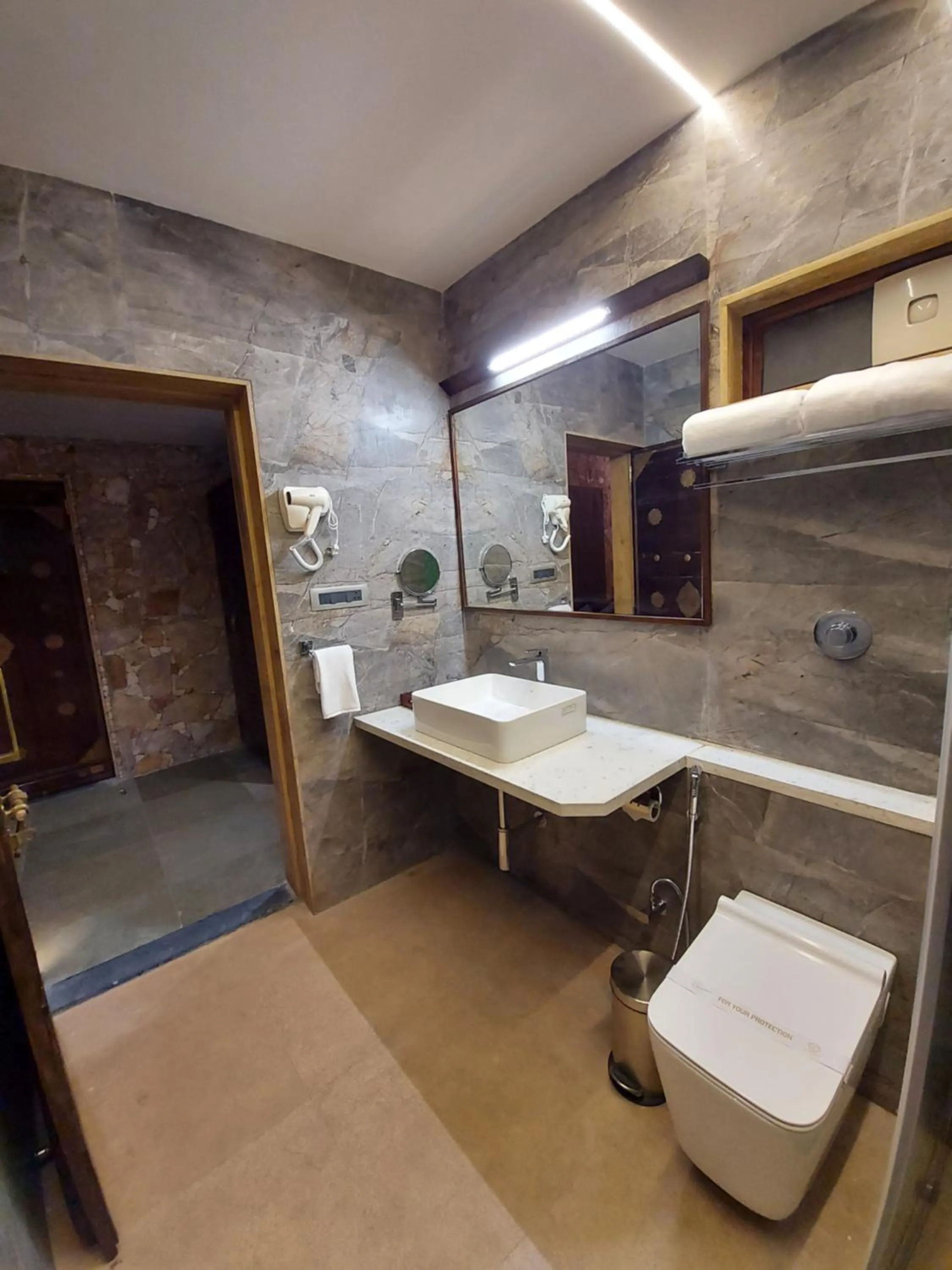 Bathroom in Vikrama Heritage Resort Pavagadh
