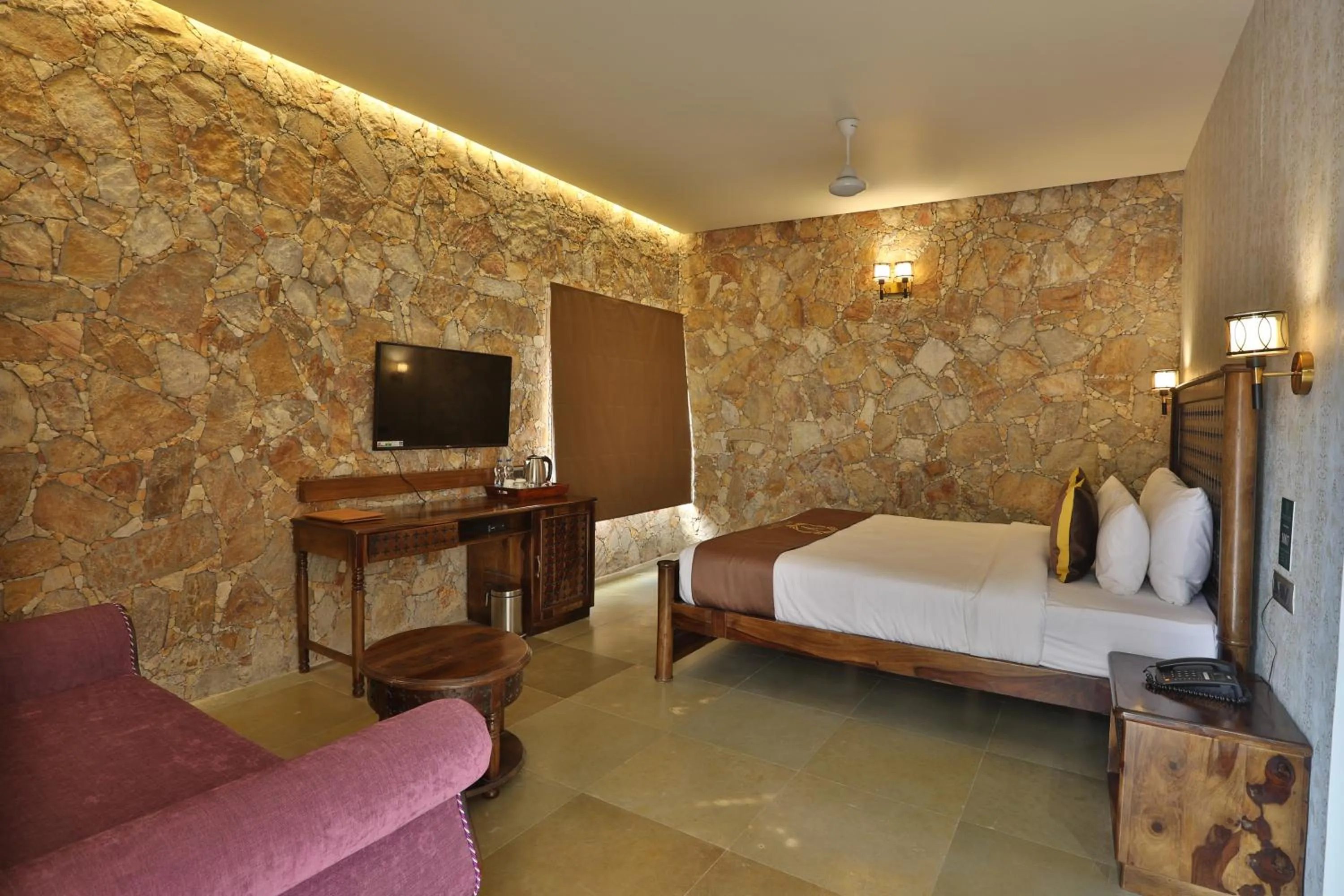 Bedroom, Bed in Vikrama Heritage Resort Pavagadh