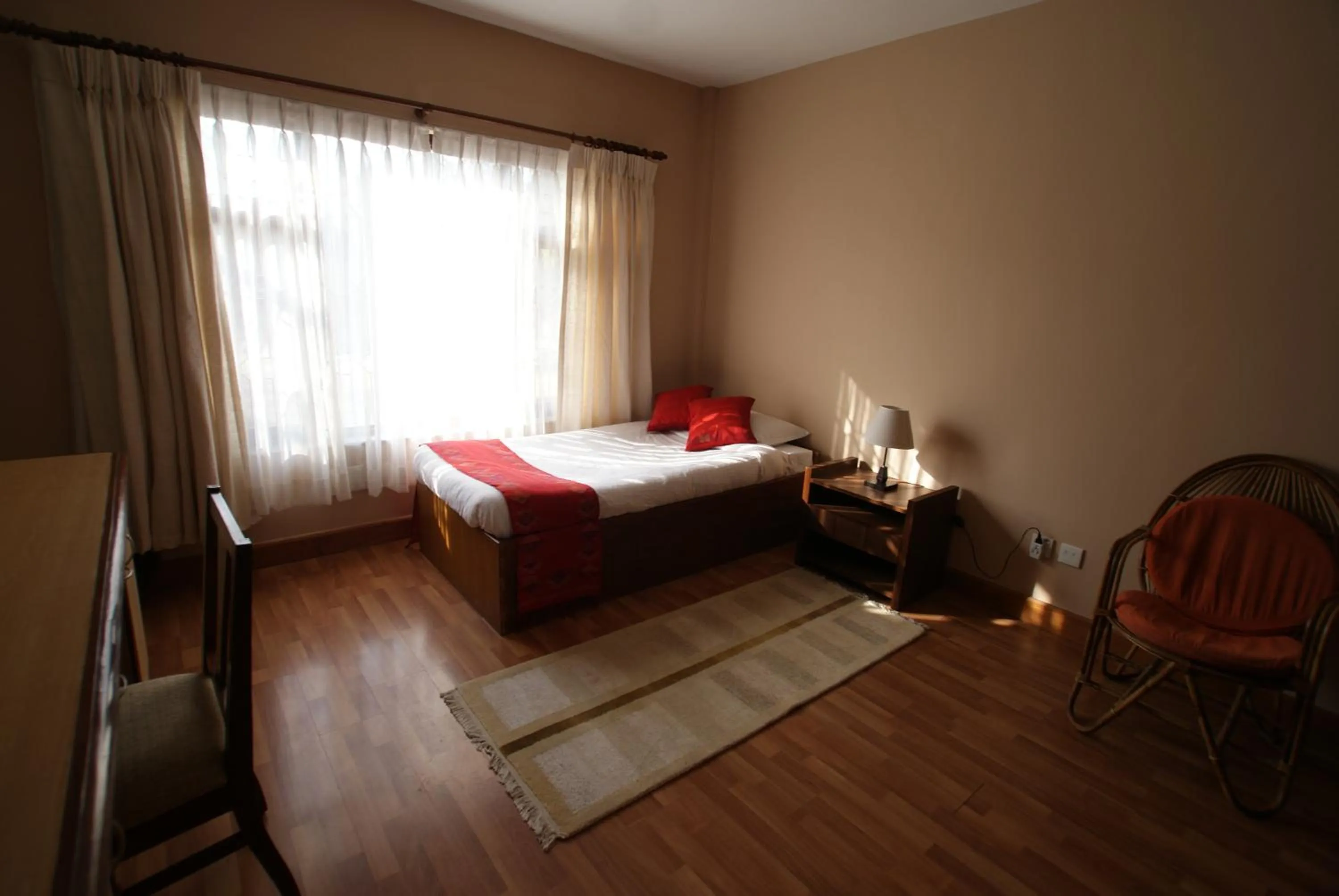 Bed in ROKPA Guest House