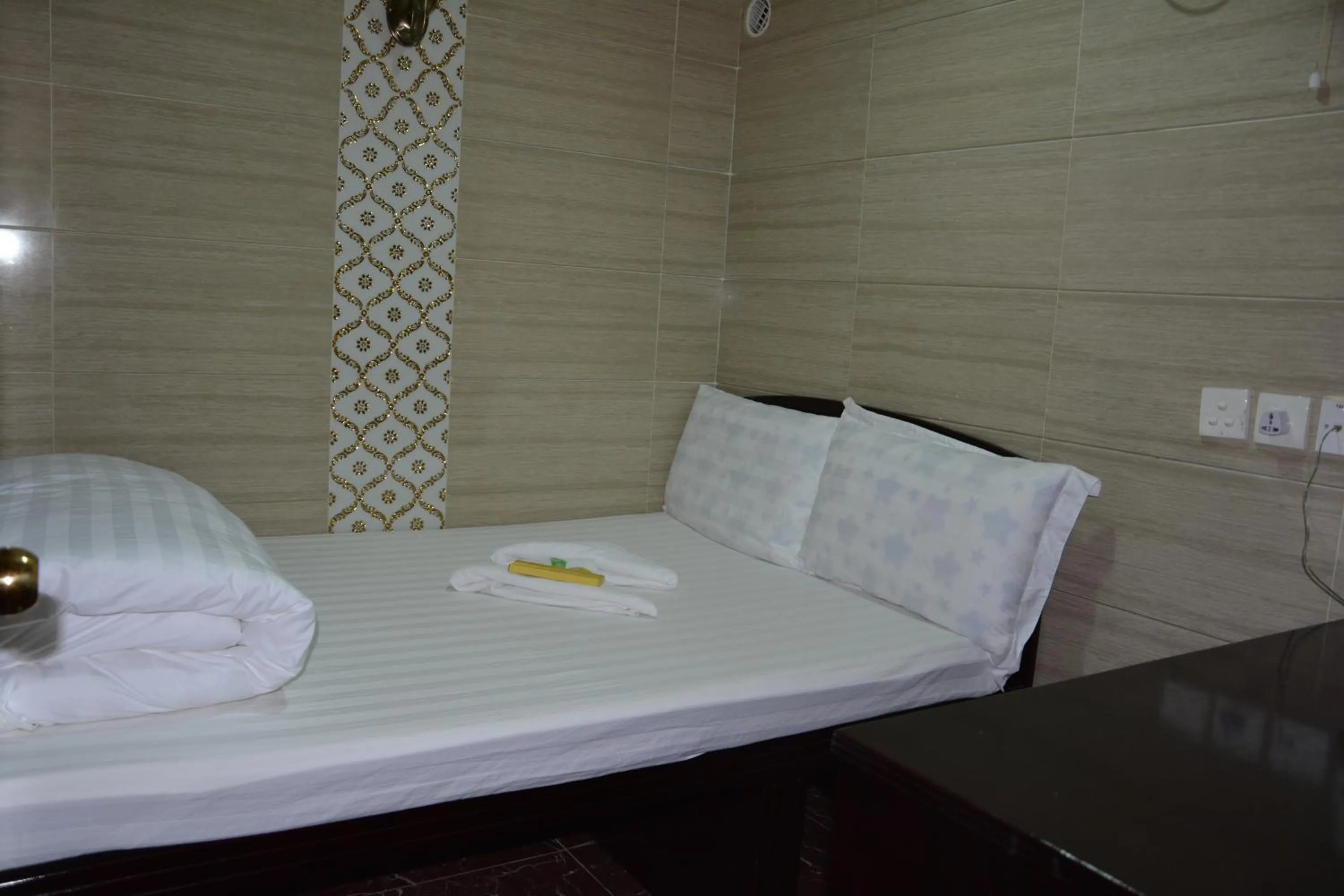 cot, Bed in Everest Guest House