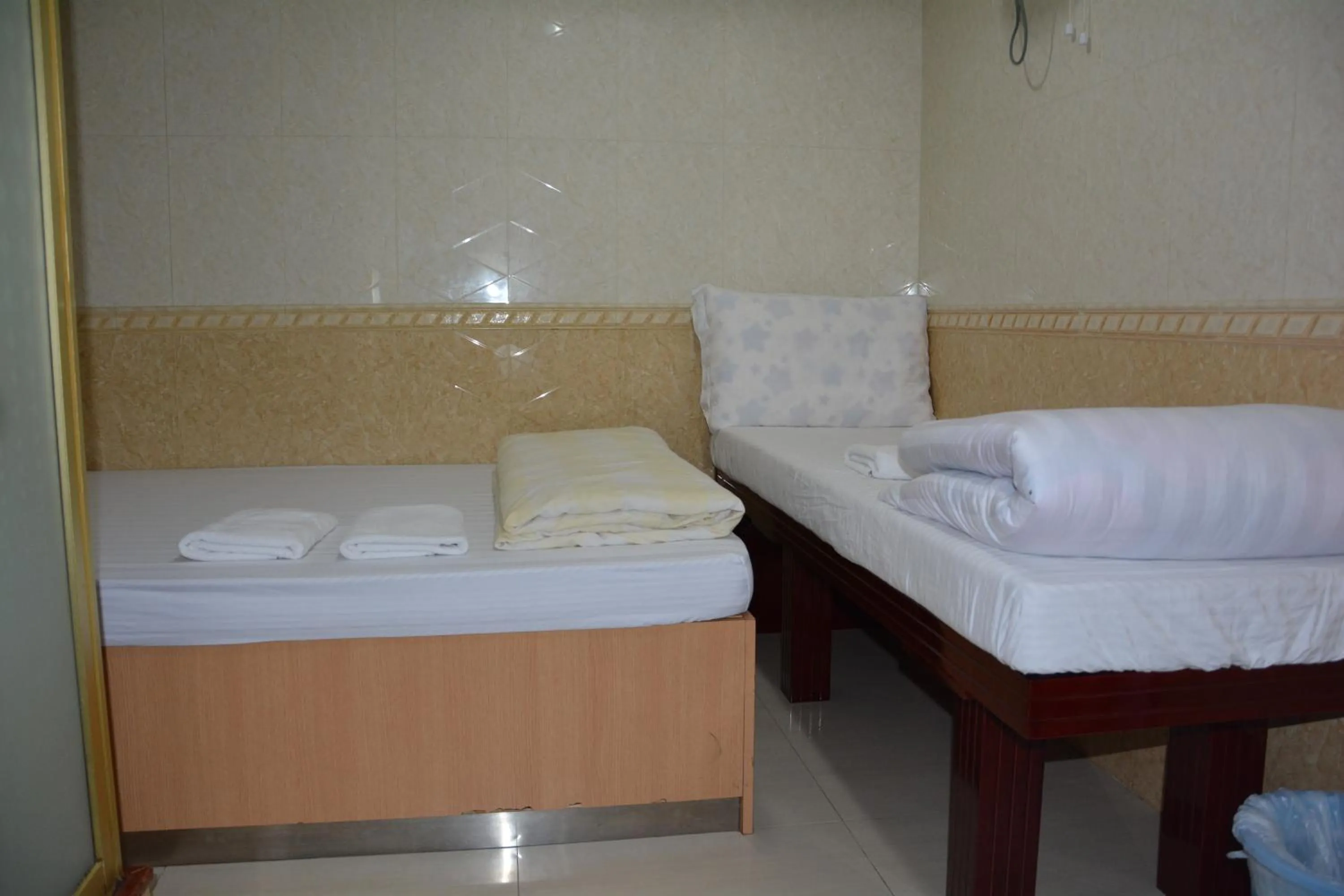 cot, Bed in Everest Guest House