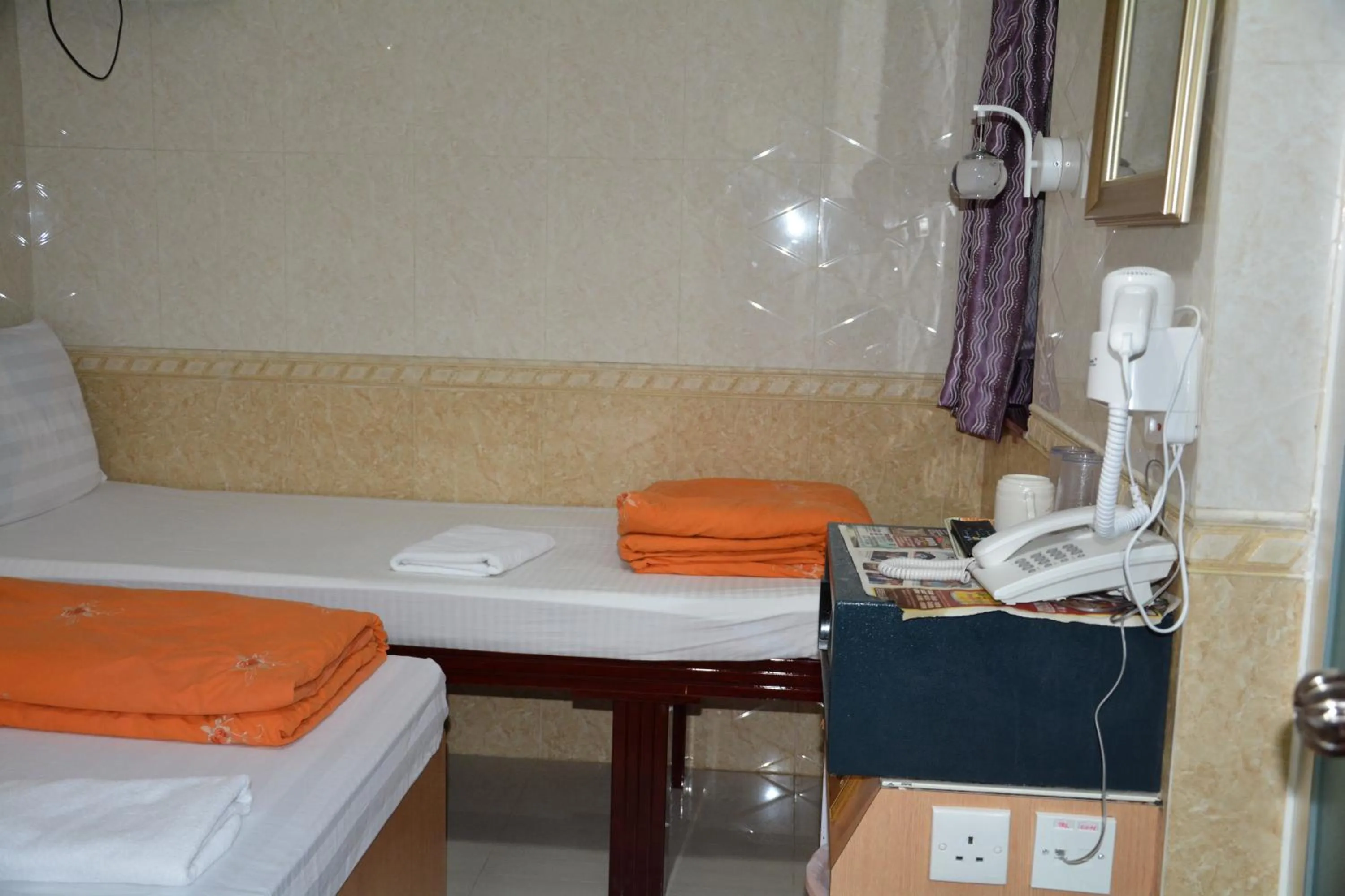 cot, Bed in Everest Guest House