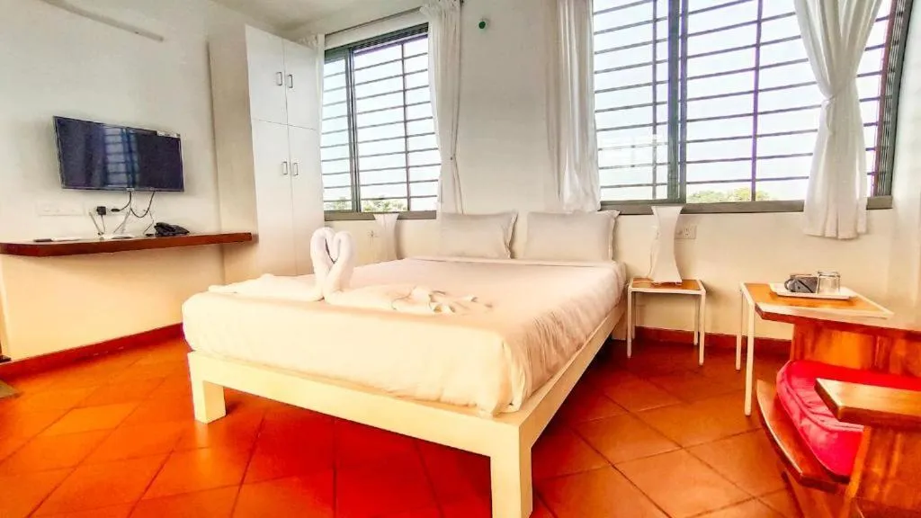 Bed in The Canopy Guest House