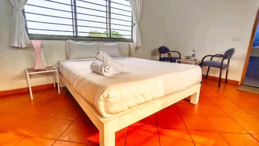 Bed in The Canopy Guest House