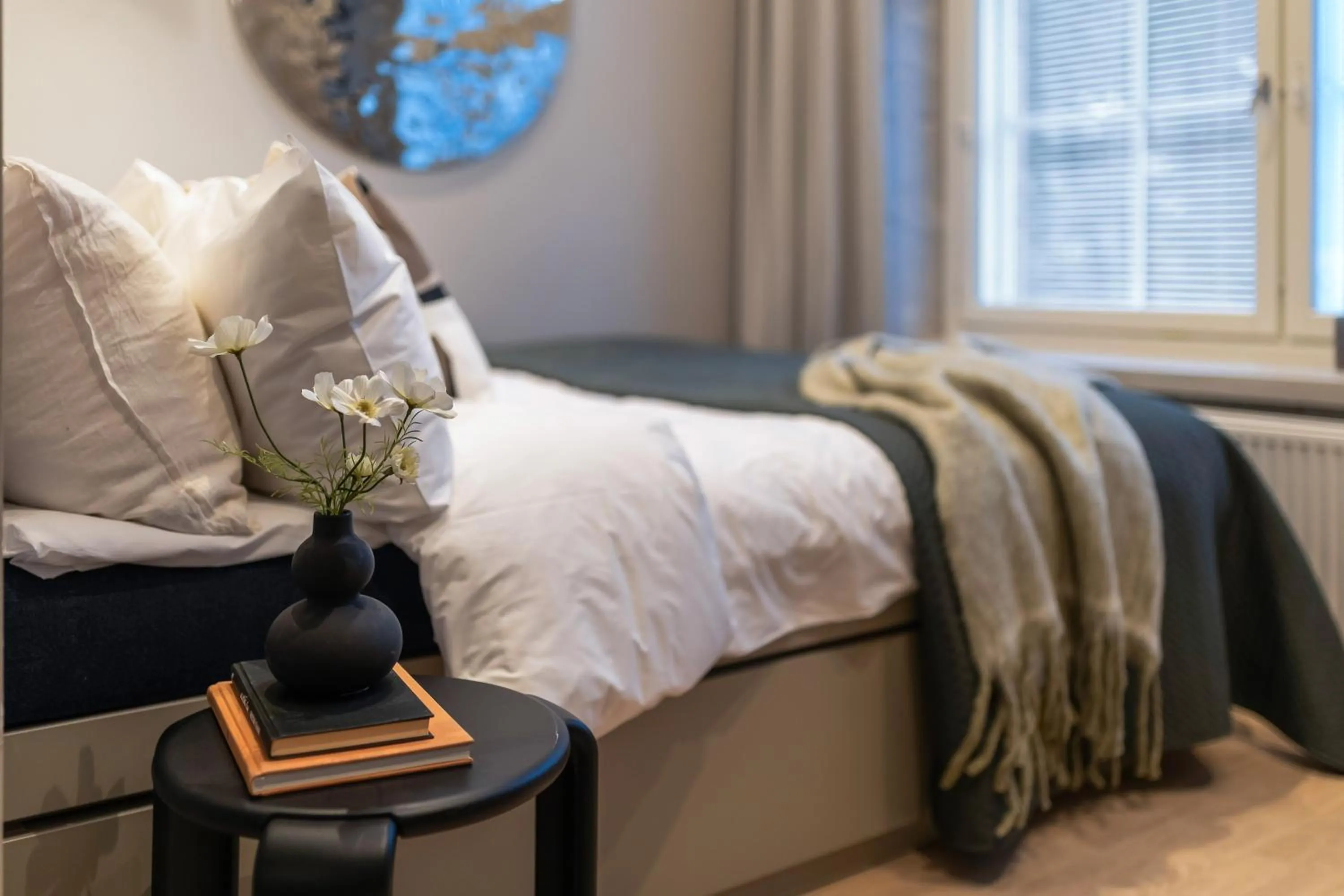 Bed in Unity Tampere - A Studio Hotel