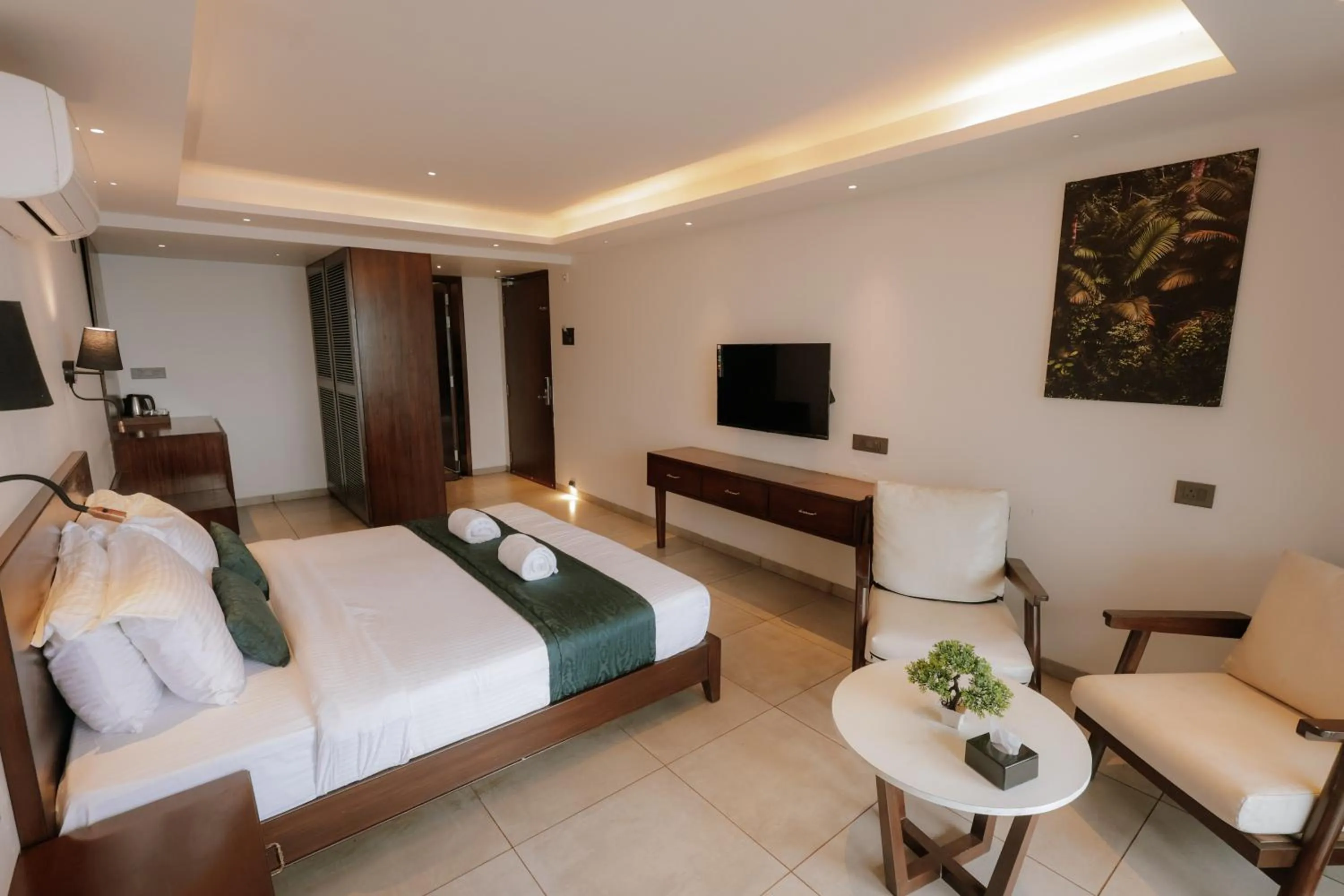 Bed in Vee Resort- The Suites of Royals