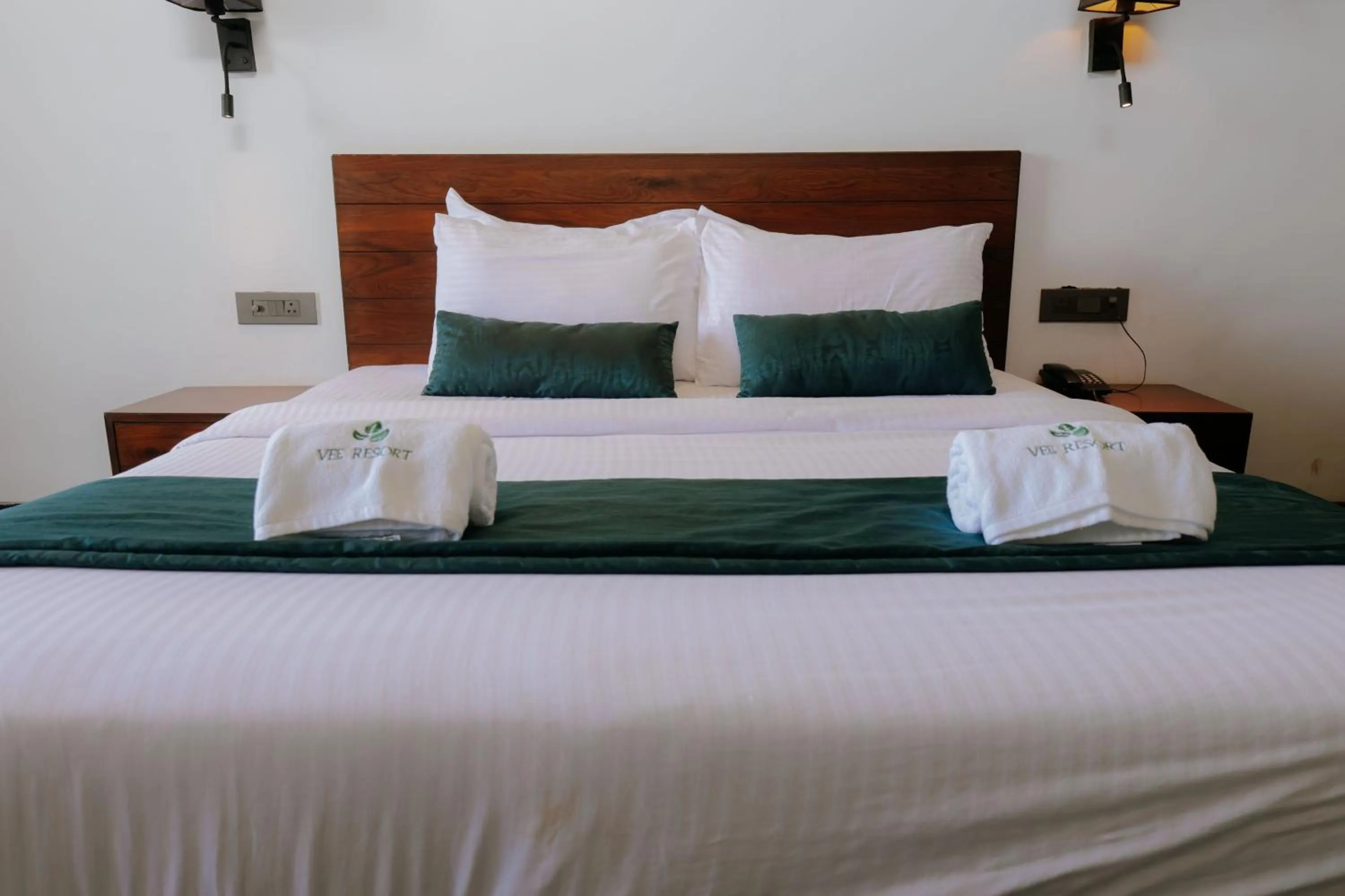 Bed in Vee Resort- The Suites of Royals