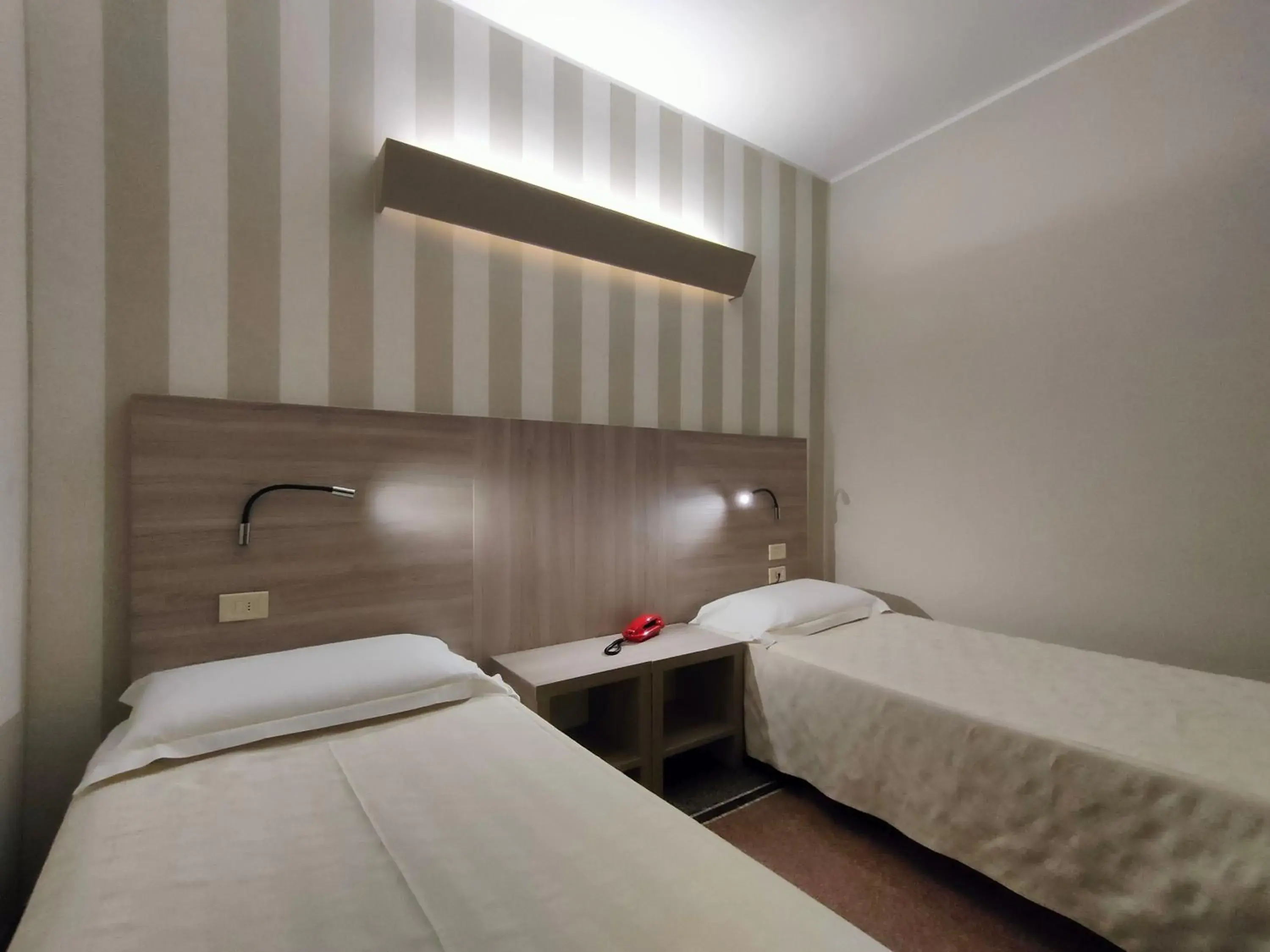 Twin Room in Hotel Vittoria Twin Room in Hotel Vittoria