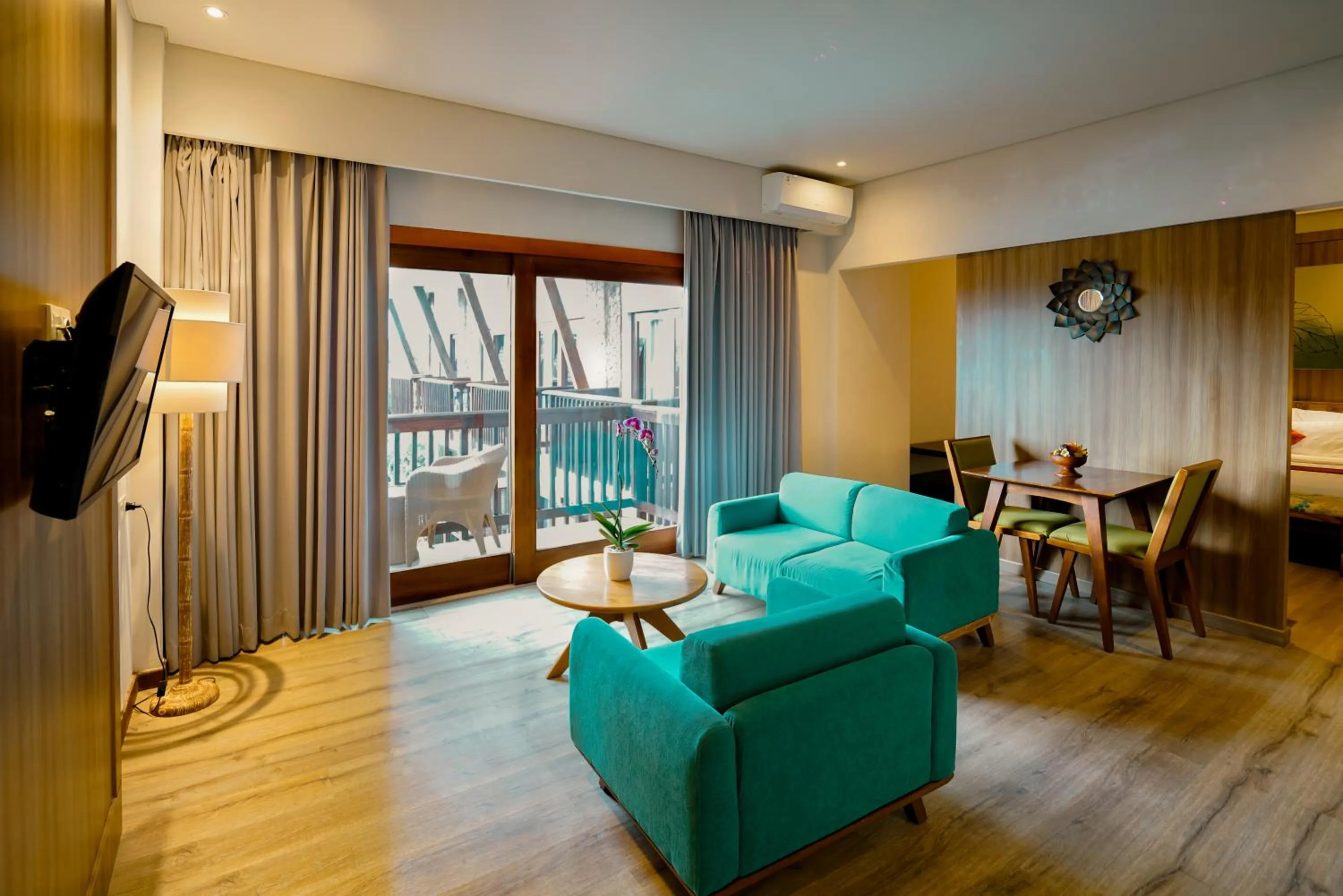 Communal lounge/ TV room in The Kirana Canggu Hotel