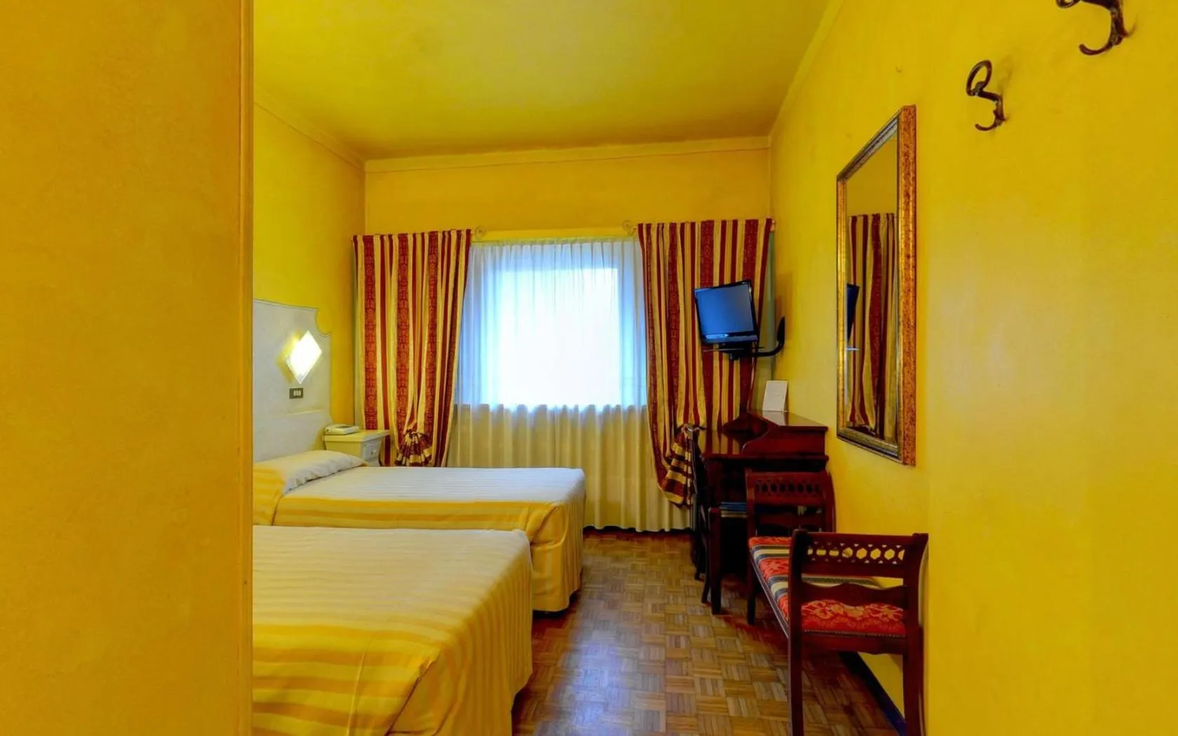 Bed in Ai Ronchi Motor Hotel Brescia