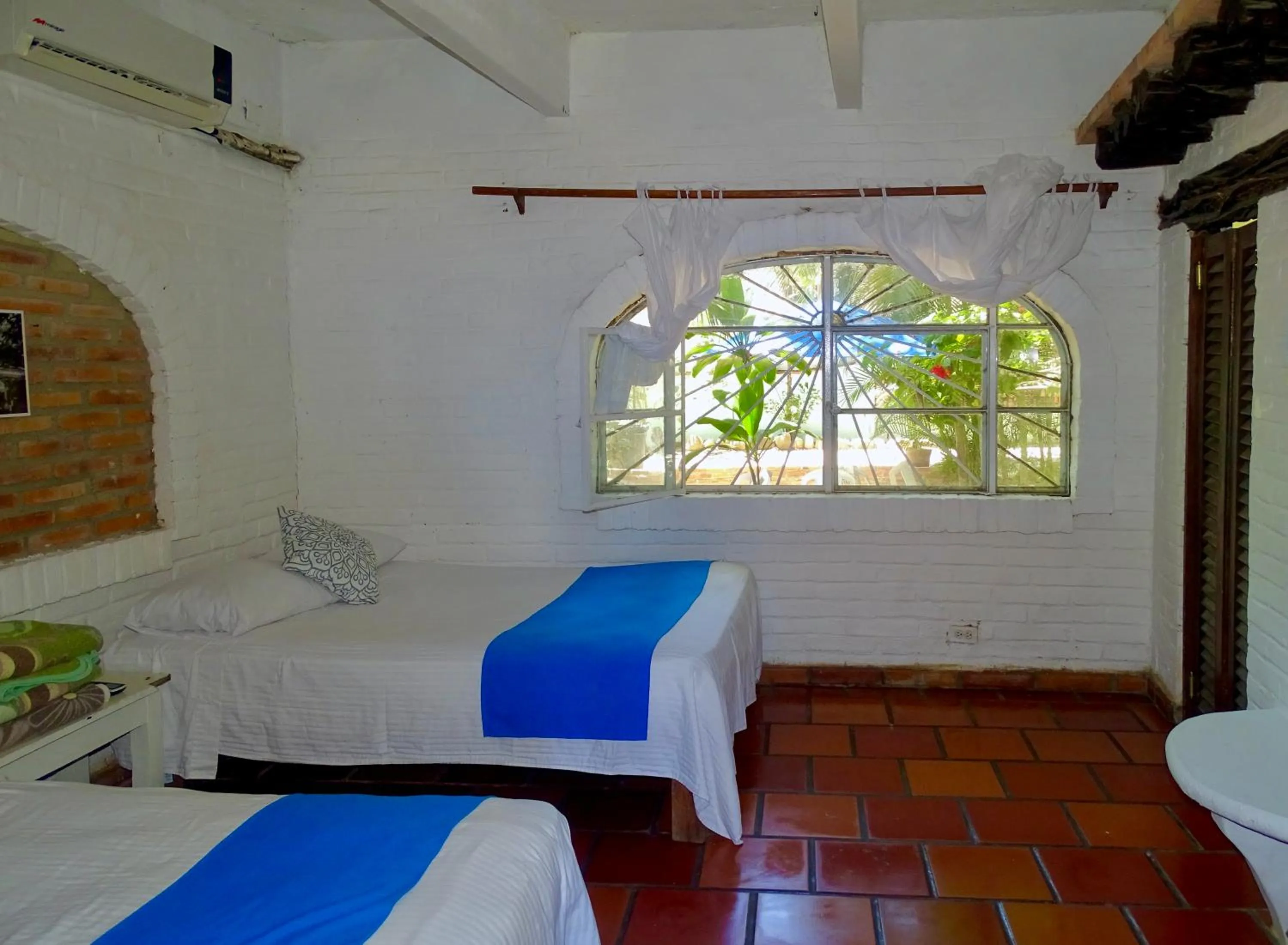 Bed in Sayulita Beach House Hotel