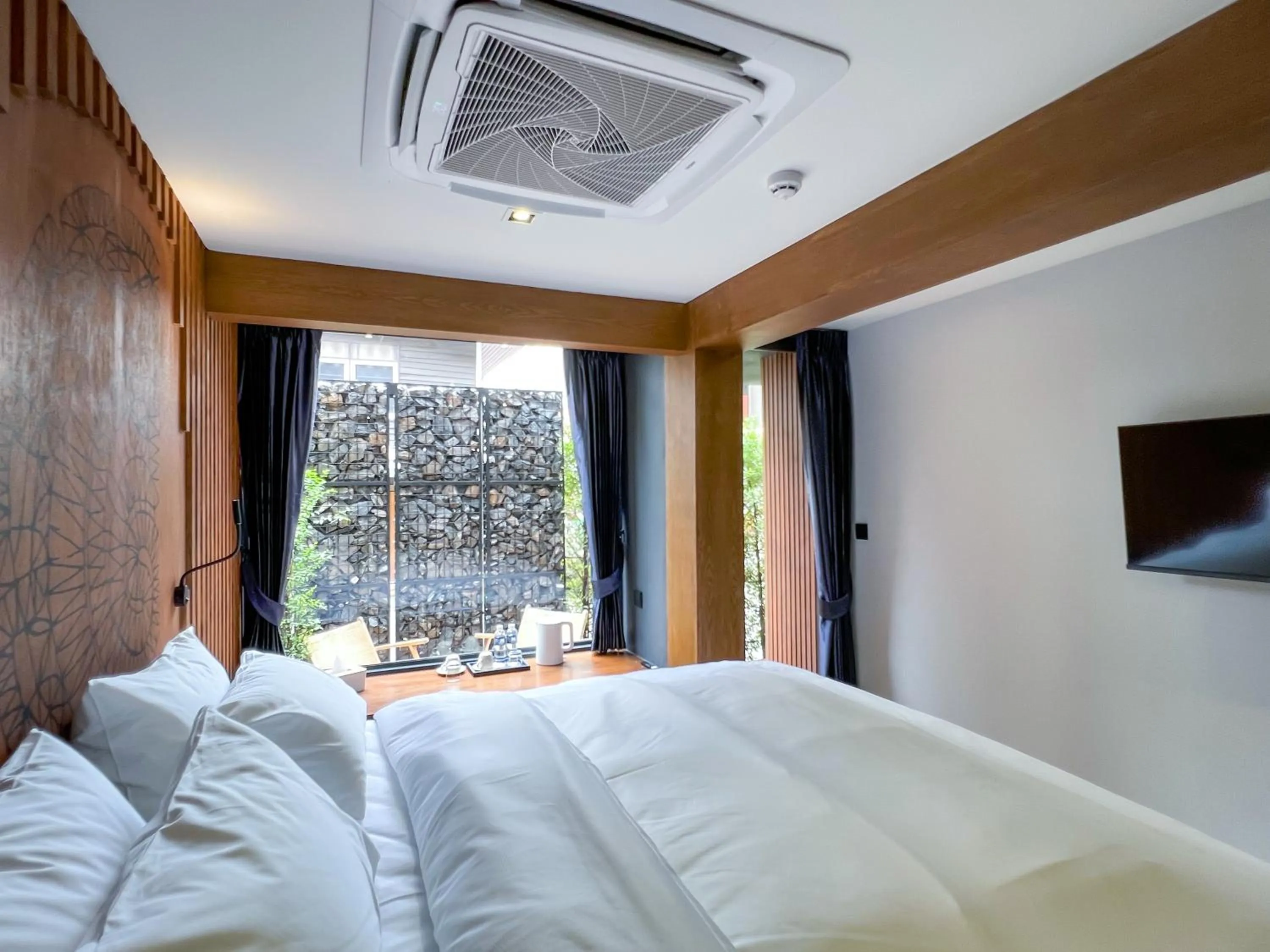 Photo of the whole room, Bed in The Nhorm Hotel Ratchada