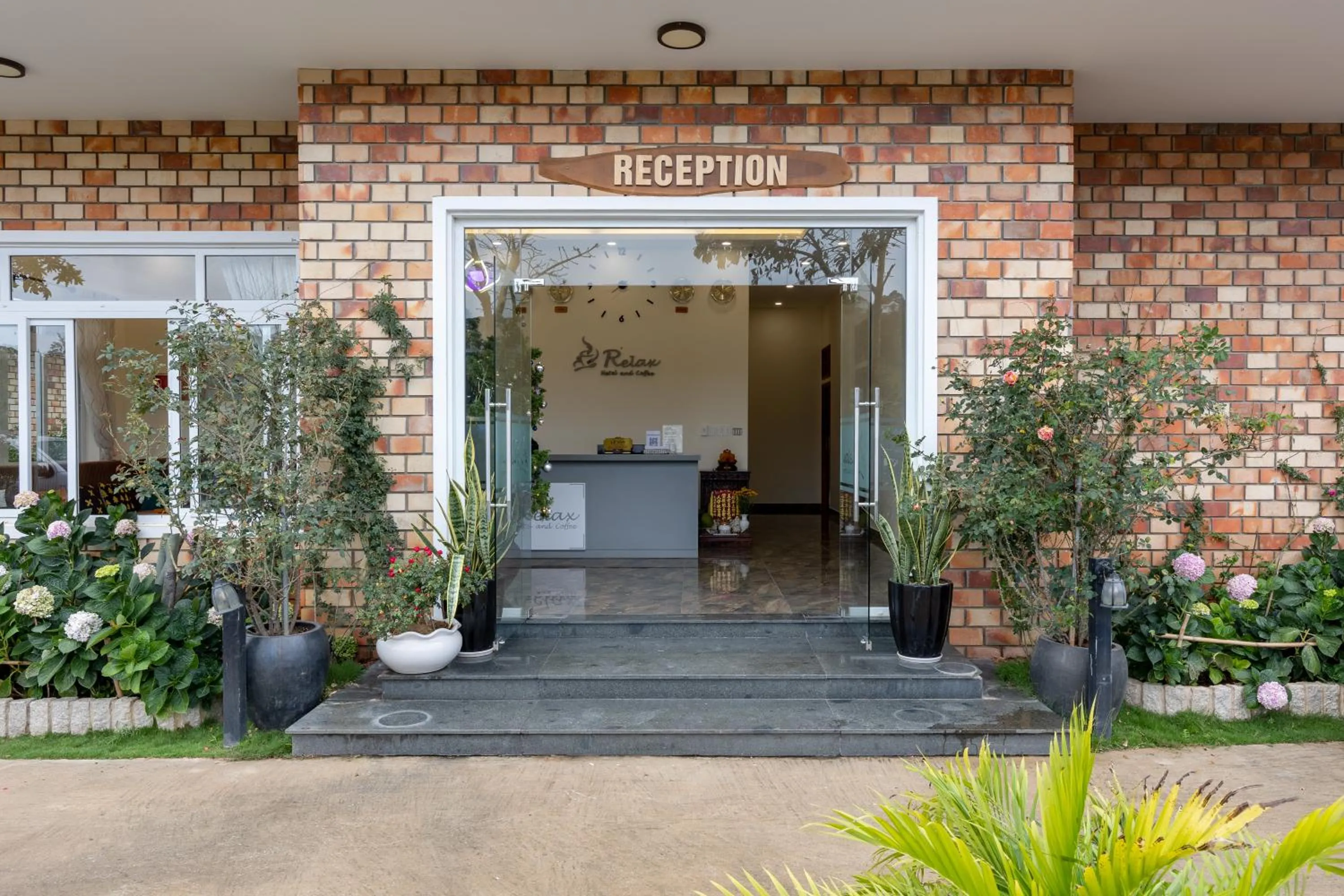 Facade/entrance in Relax Hotel by Ixorat