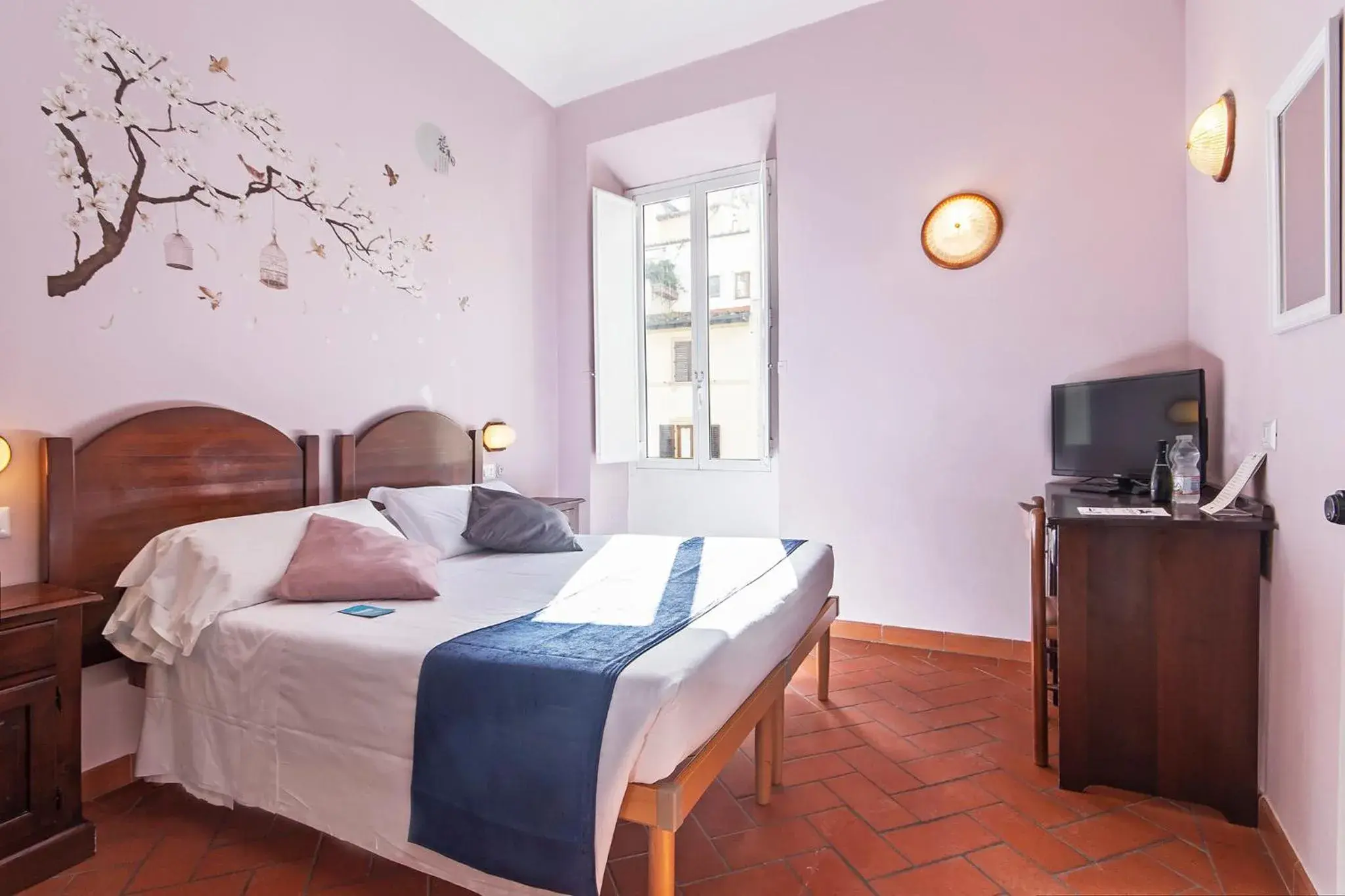 Bed in Hotel Costantini Bed in Hotel Costantini