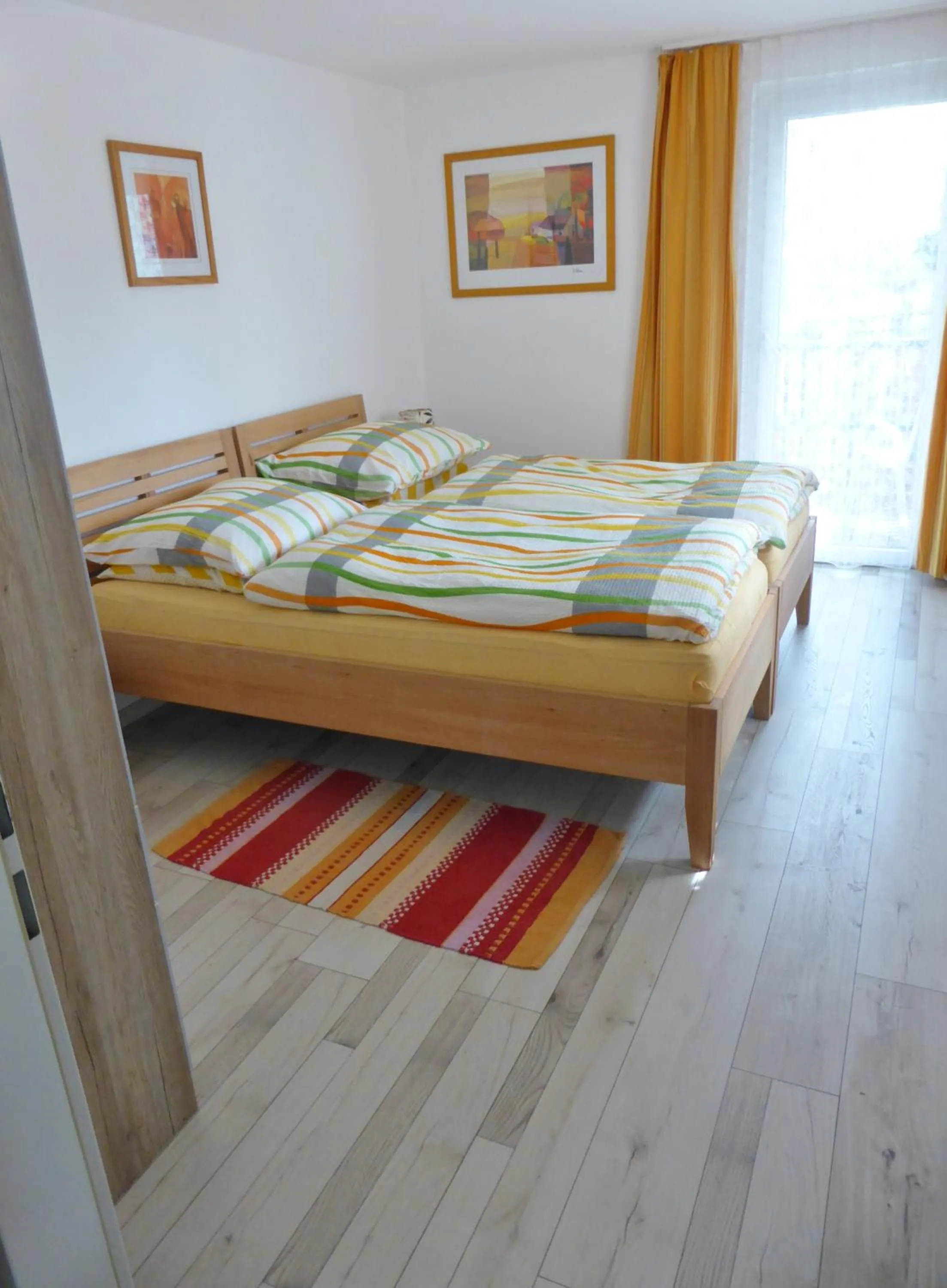 Bed in Ferienwohnung Sailer