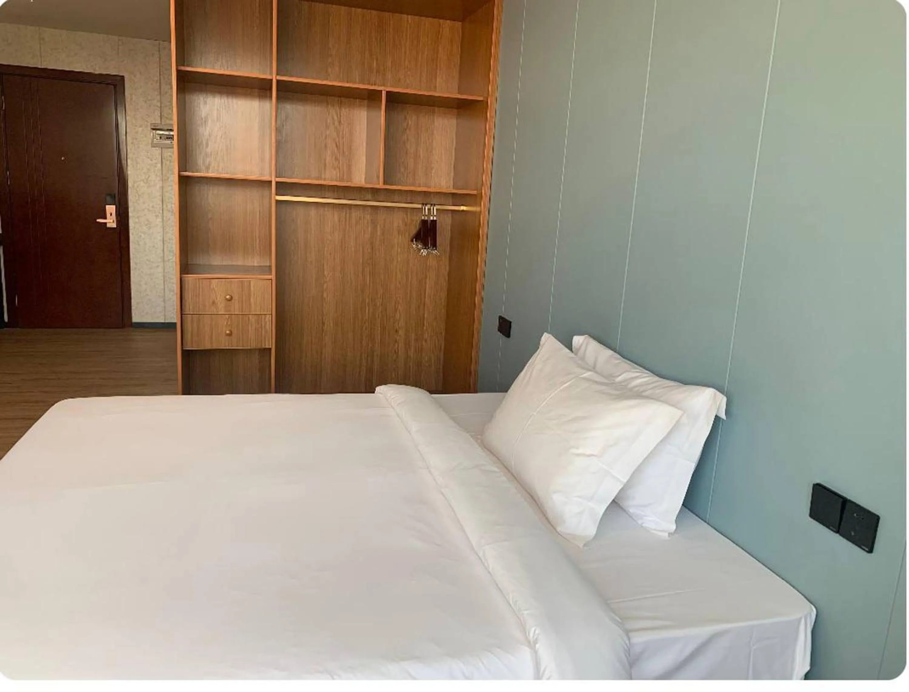 wardrobe, Bed in Joy Hotel