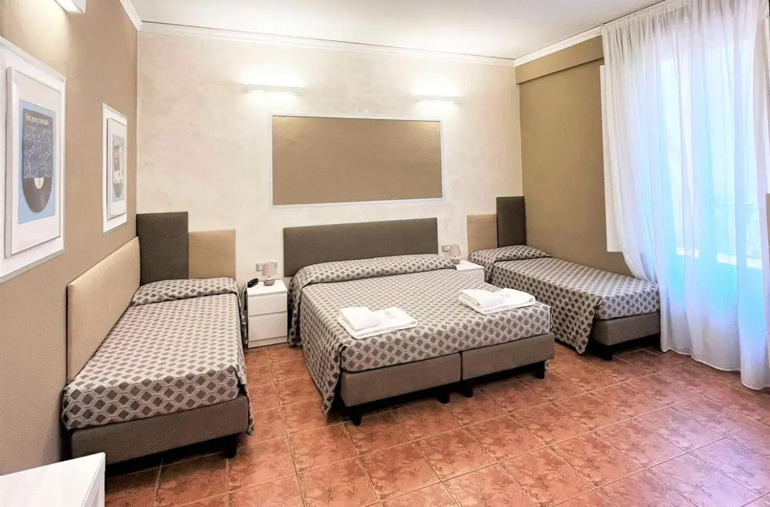 Bed in Hotel Alinari Bed in Hotel Alinari