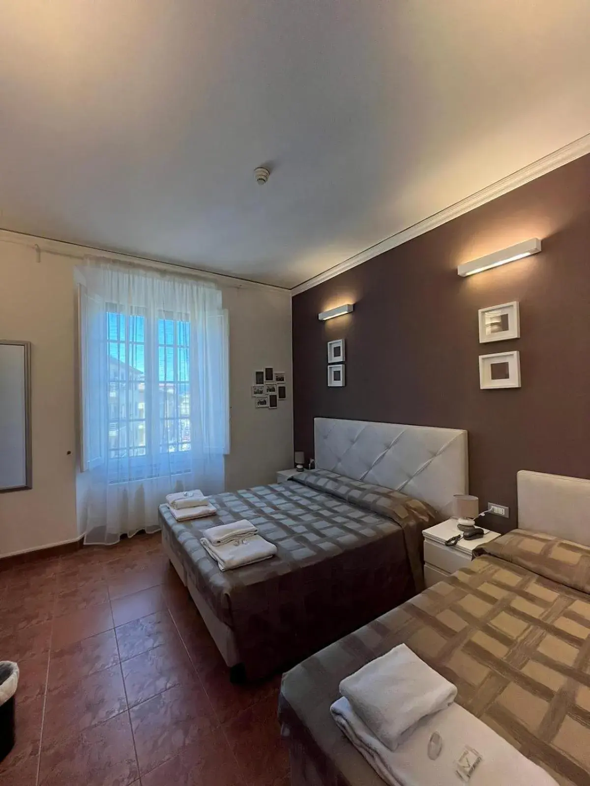 View (from property/room), Bed in Hotel Alinari View (from property/room), Bed in Hotel Alinari