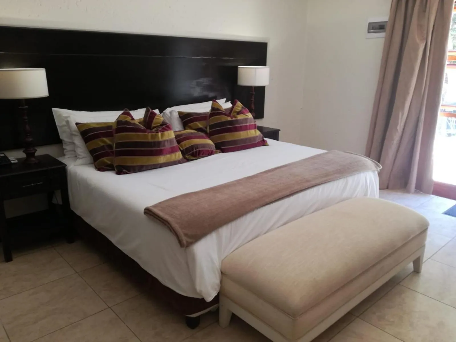 Bed in Cedar Rest Boutique Hotel