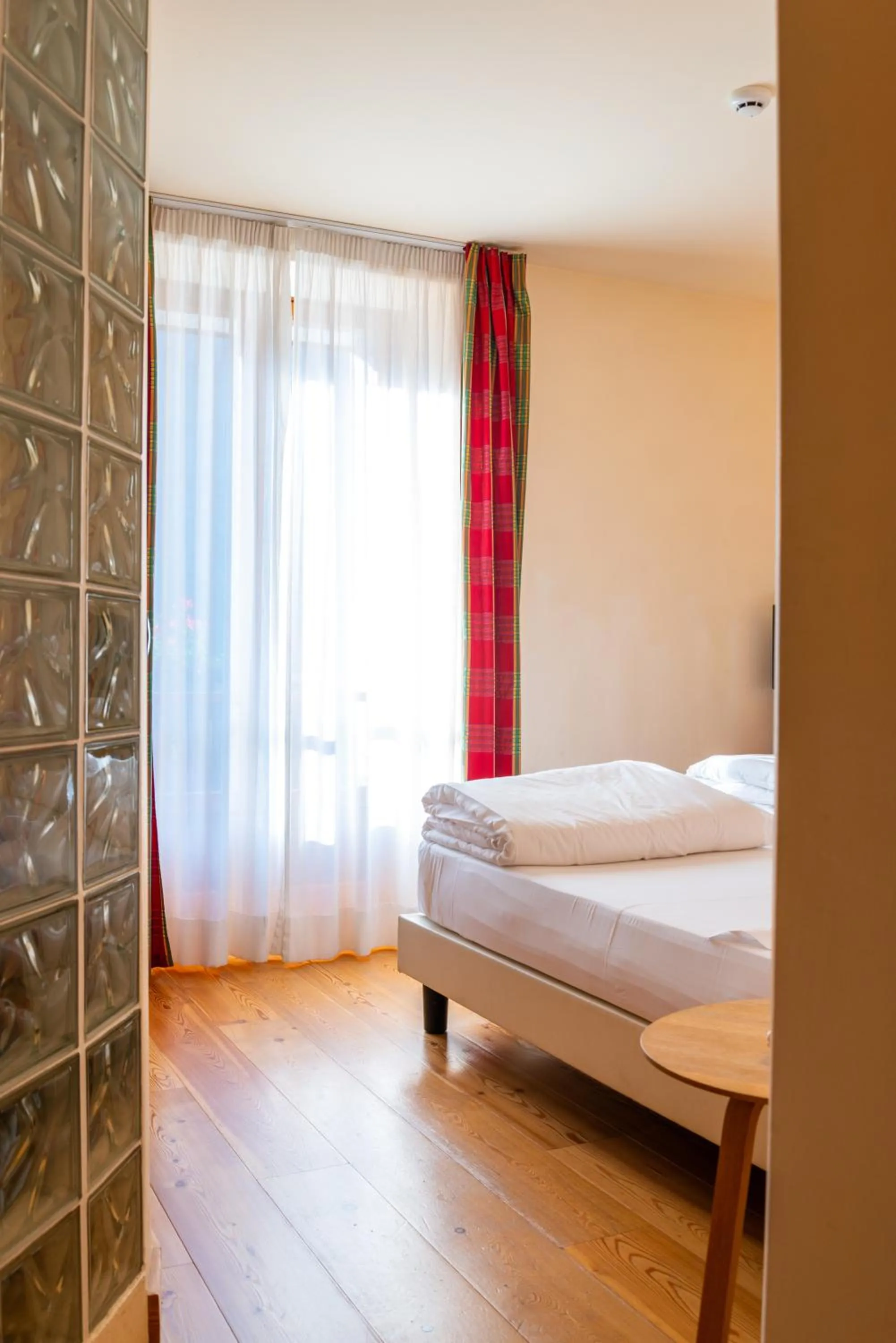 Bed in Hotel Berthod