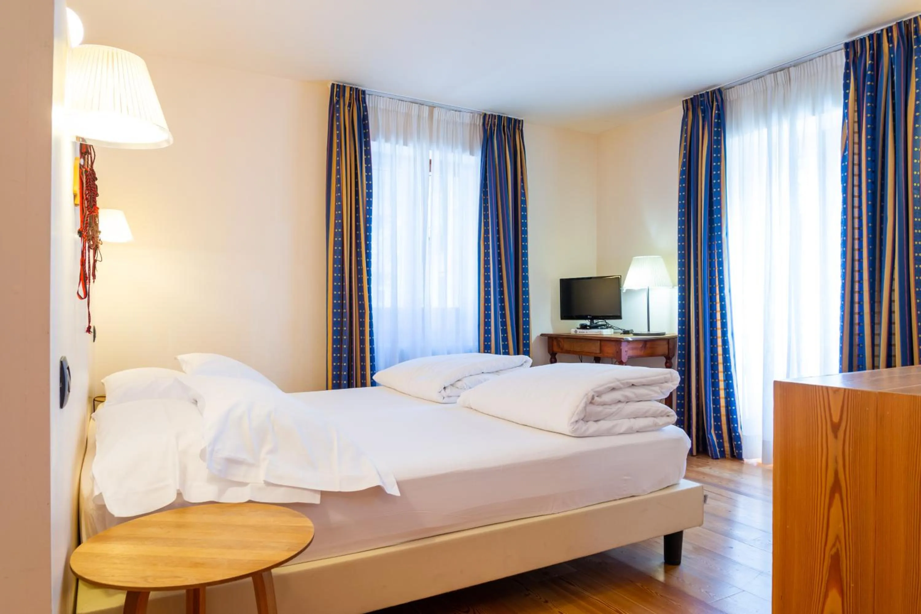 Bed in Hotel Berthod