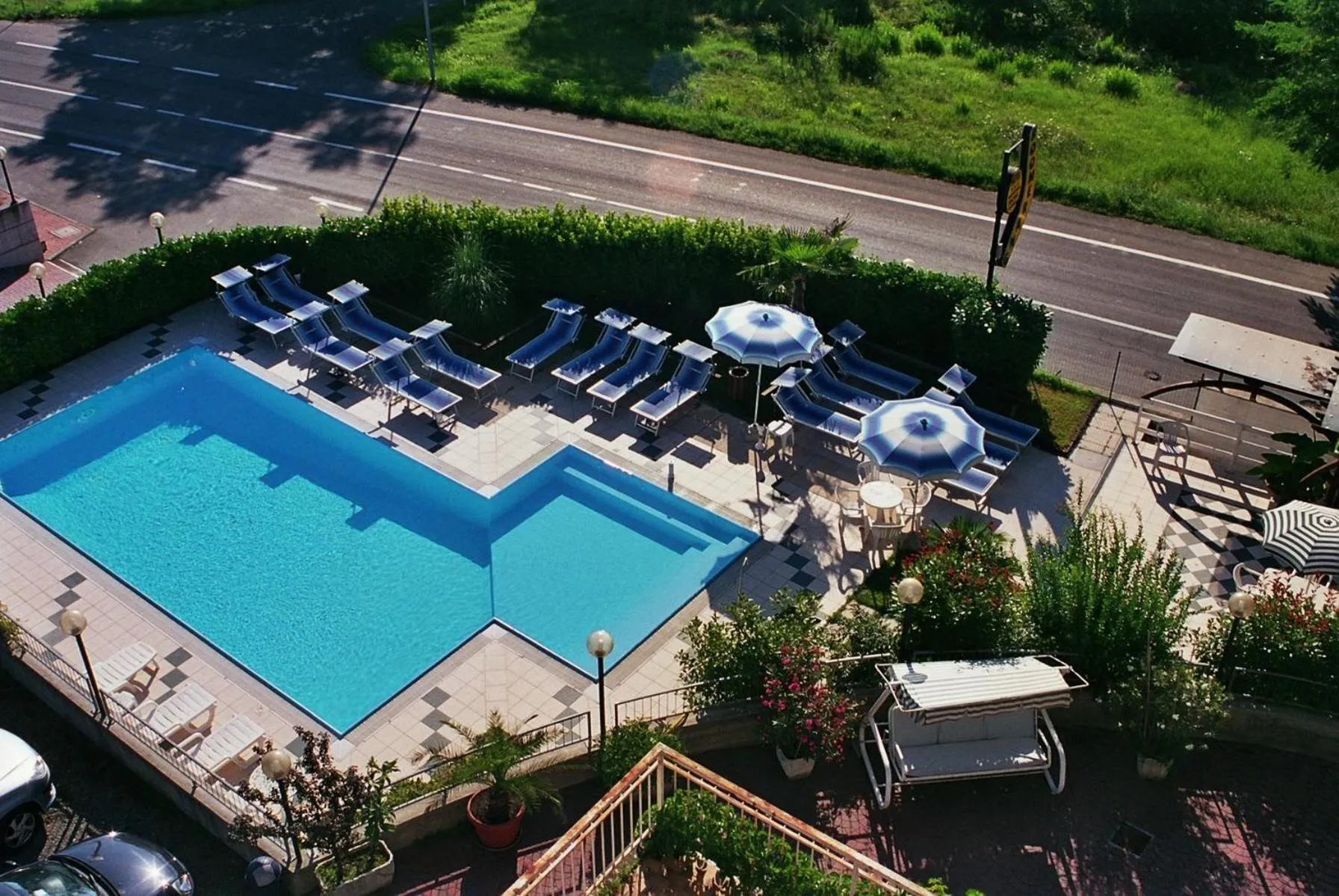 Swimming pool in Hotel Boomerang - Check-in & Meals in front at hotel Sporting