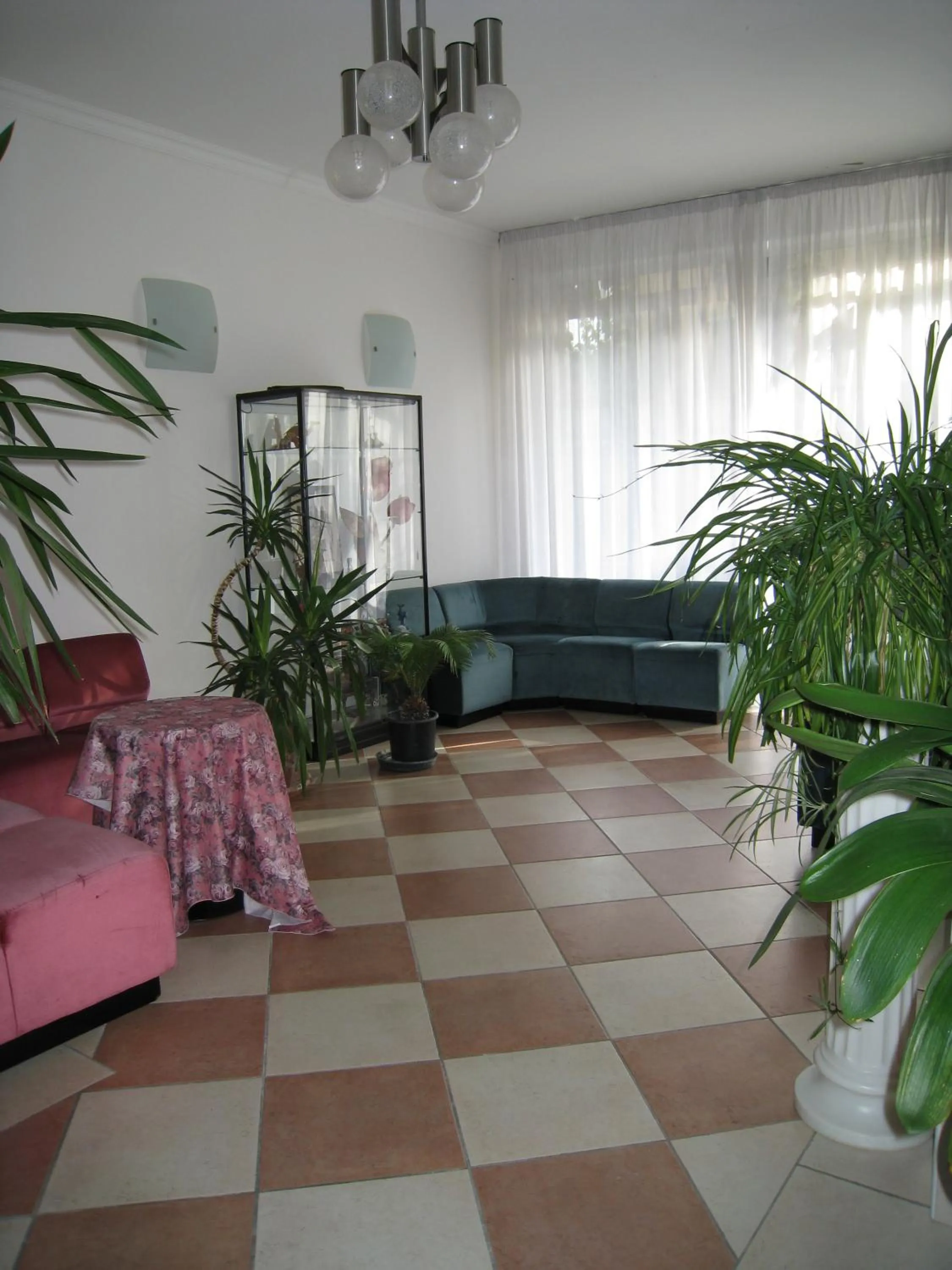 Lobby or reception in Hotel Boomerang - Check-in & Meals in front at hotel Sporting