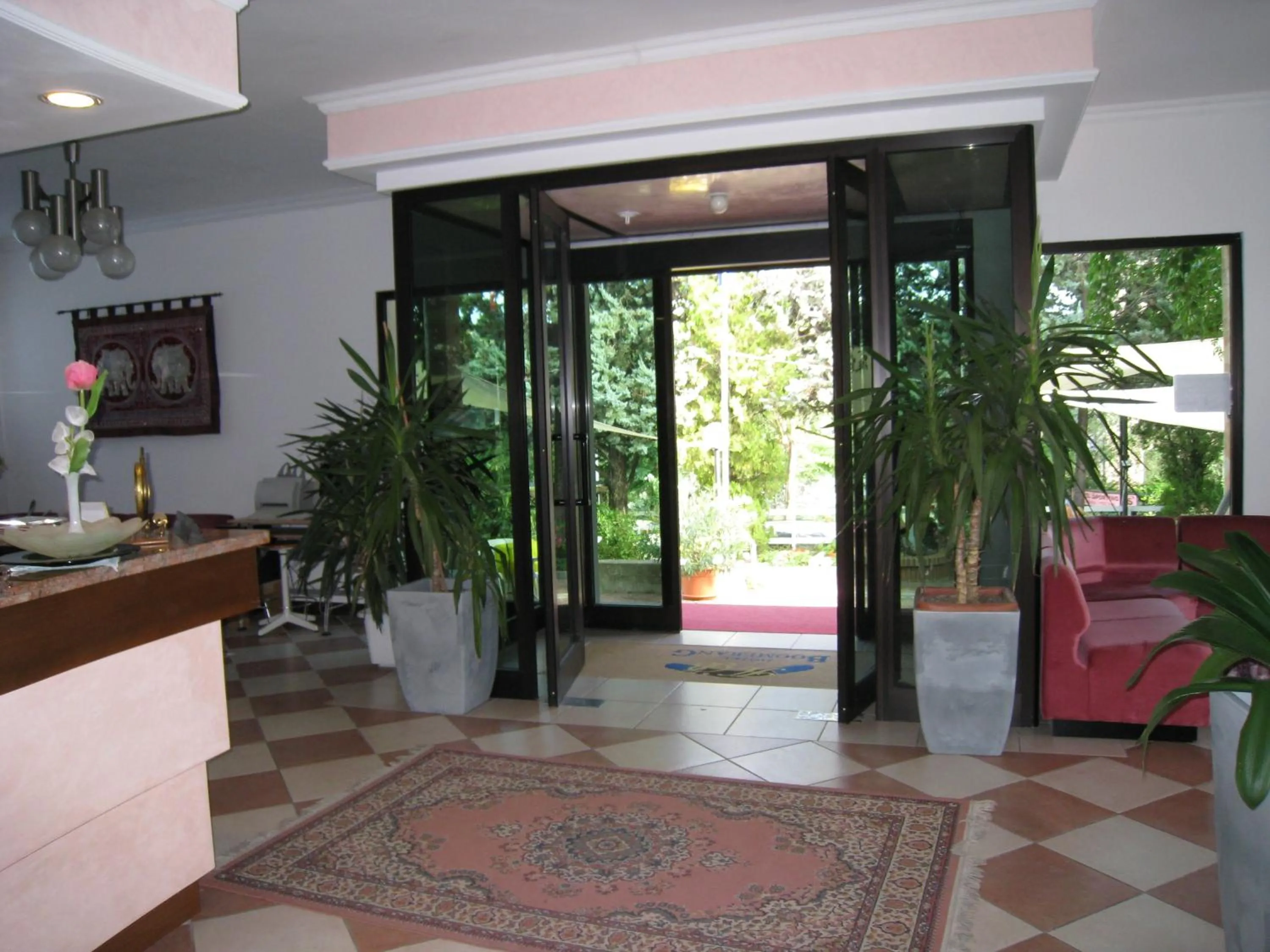 Lobby or reception in Hotel Boomerang - Check-in & Meals in front at hotel Sporting