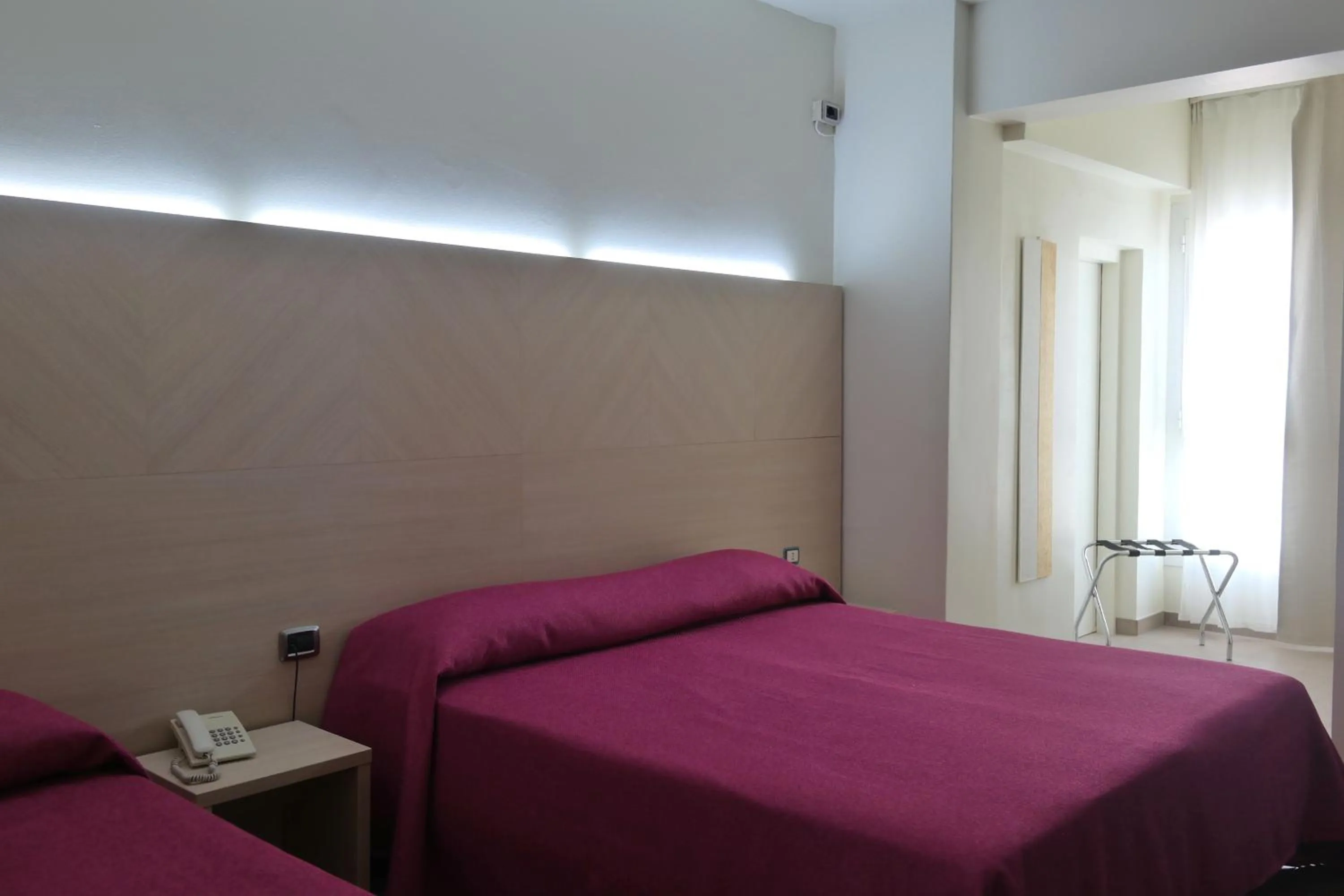 Bed in Hotel Paradiso