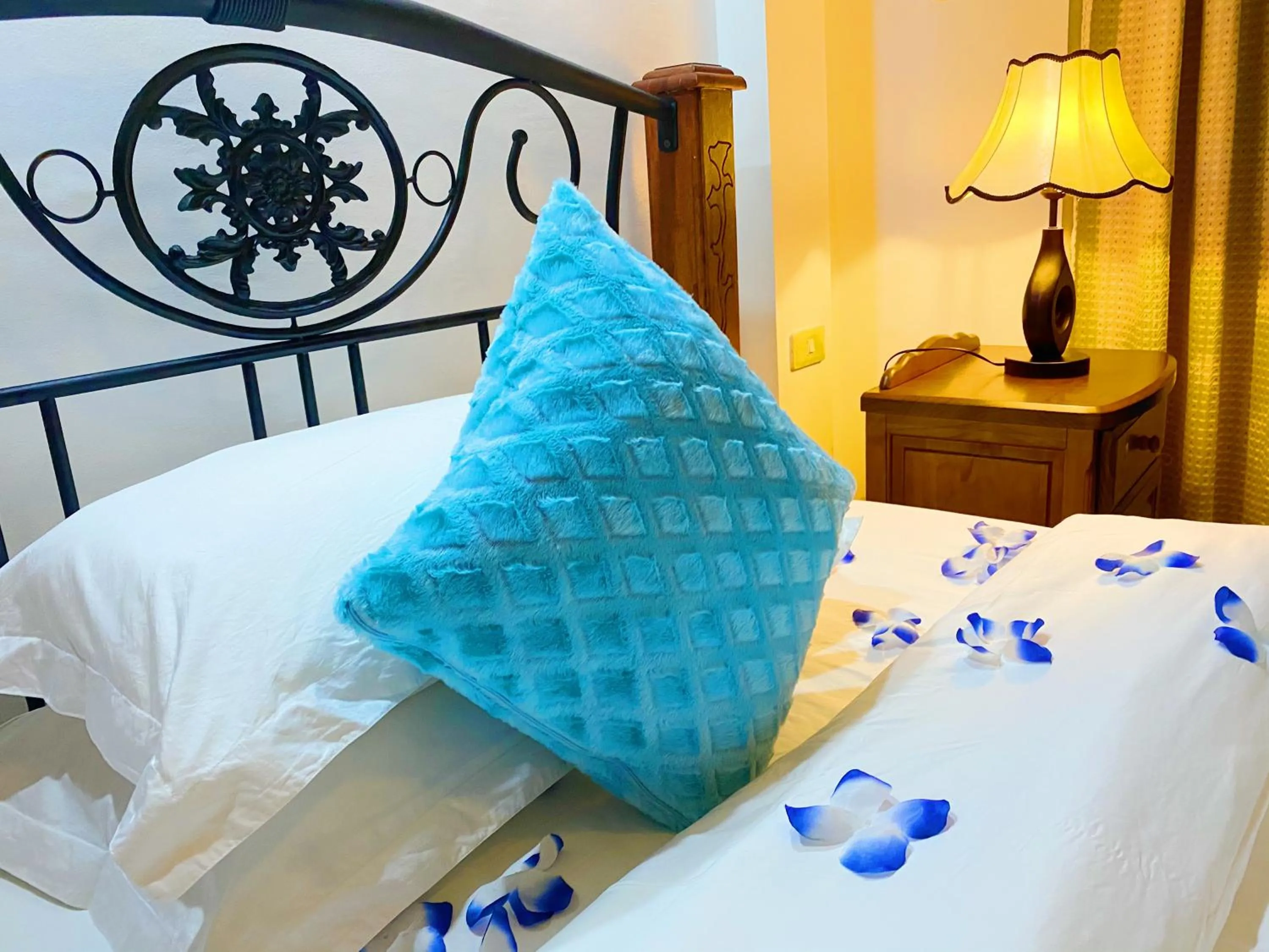 Bed in Azure Camotes Resort Hotel