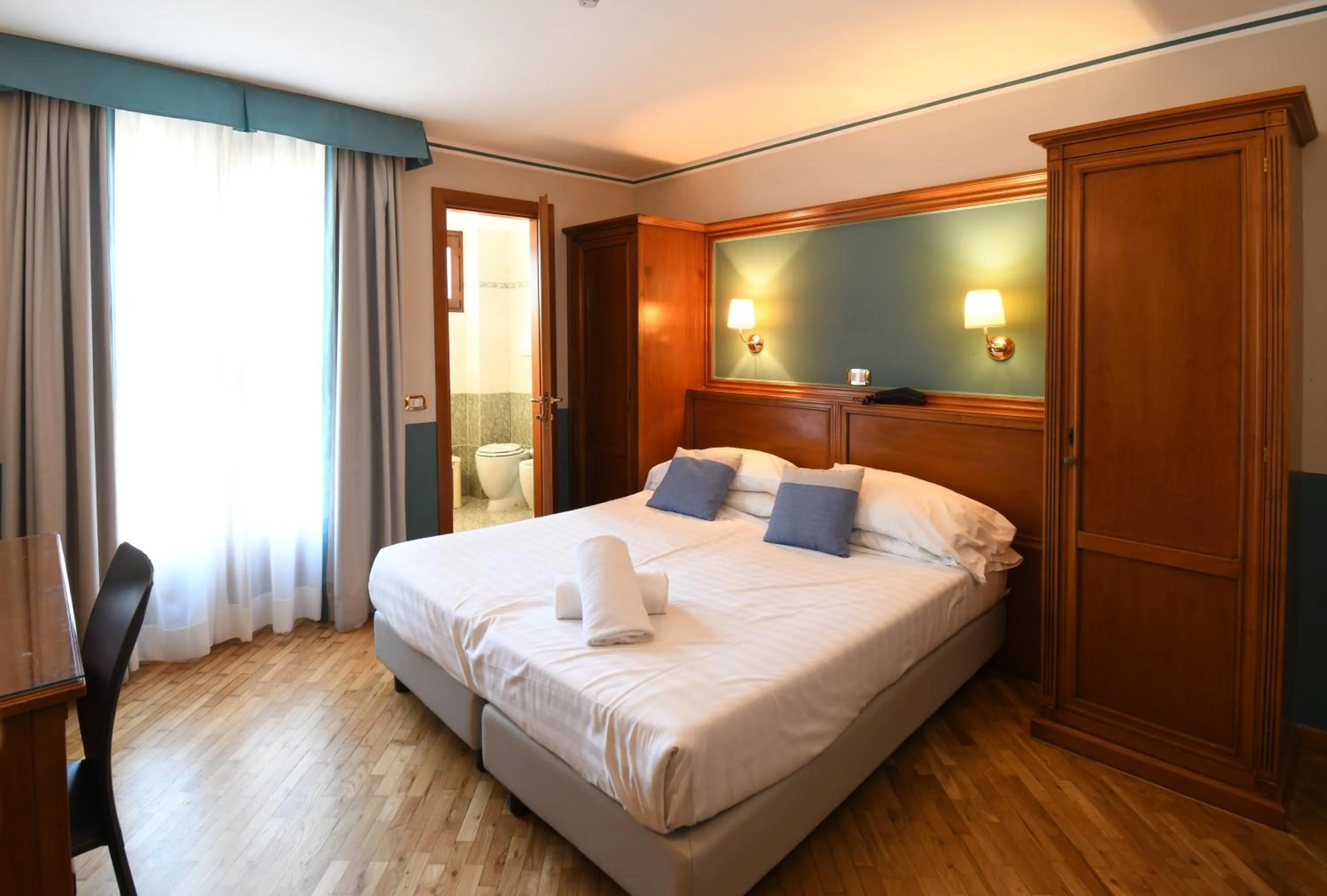 Bed in Hotel Cavour