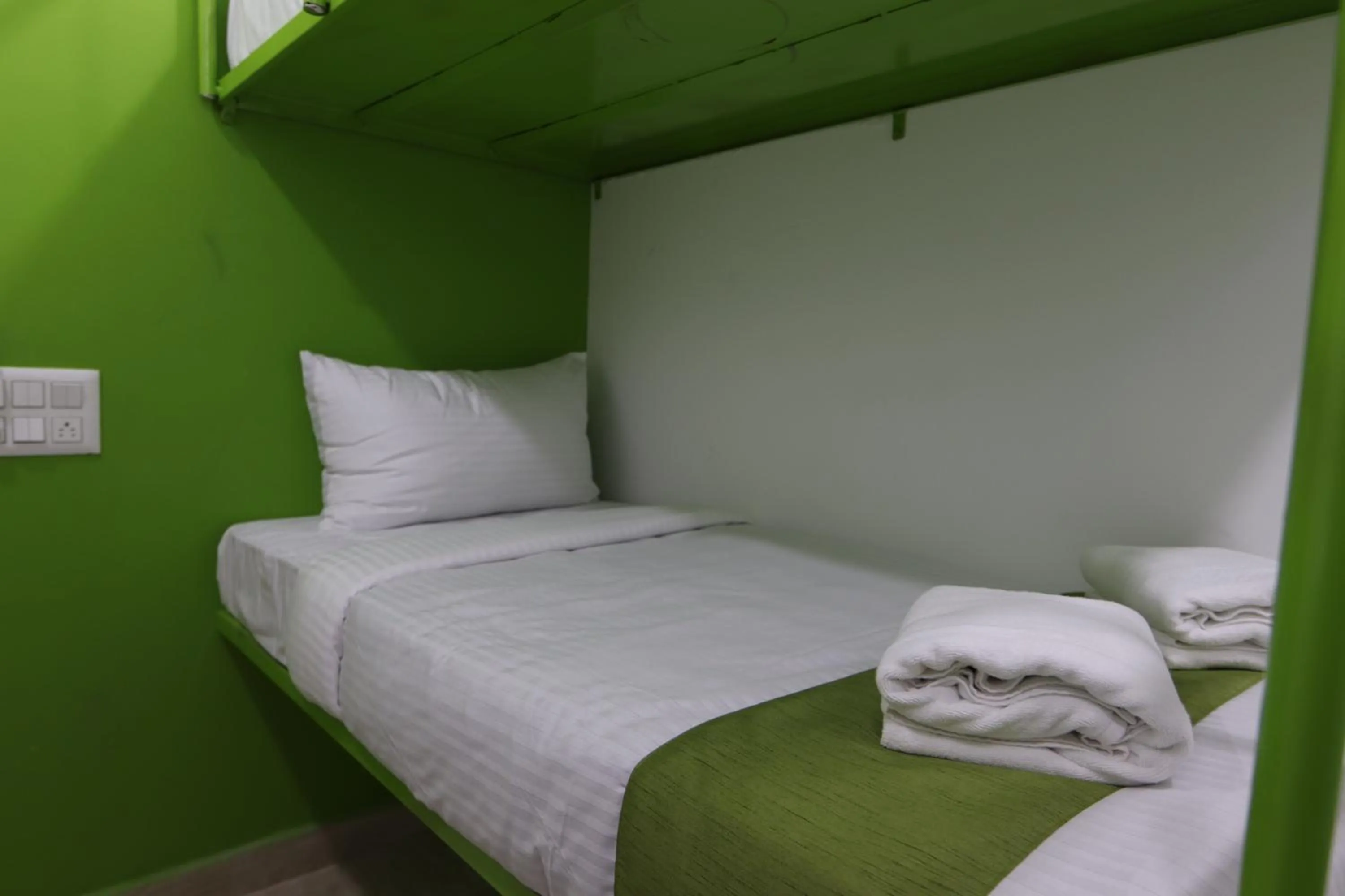 Bed in Athulya Stays