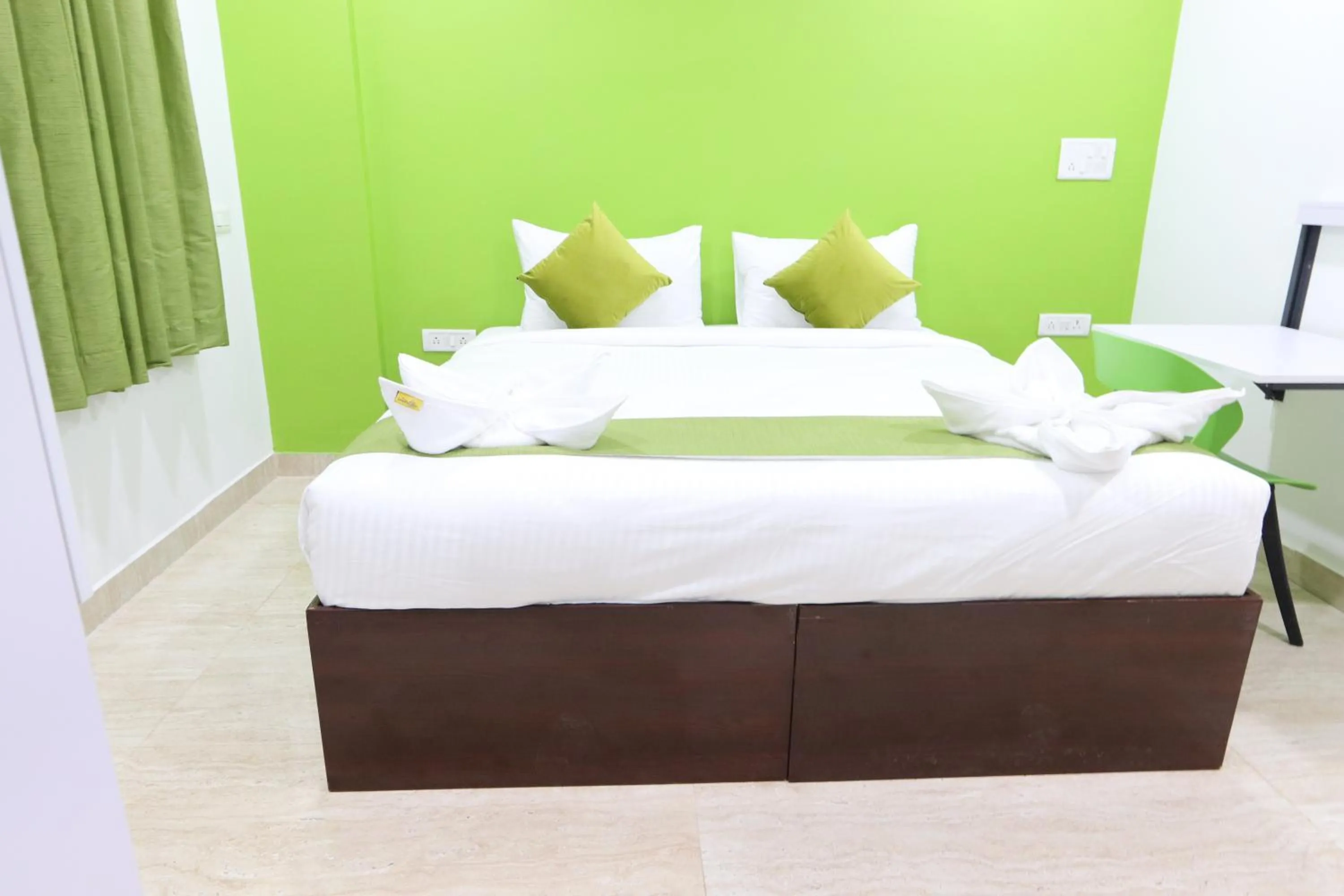 Bed in Athulya Stays