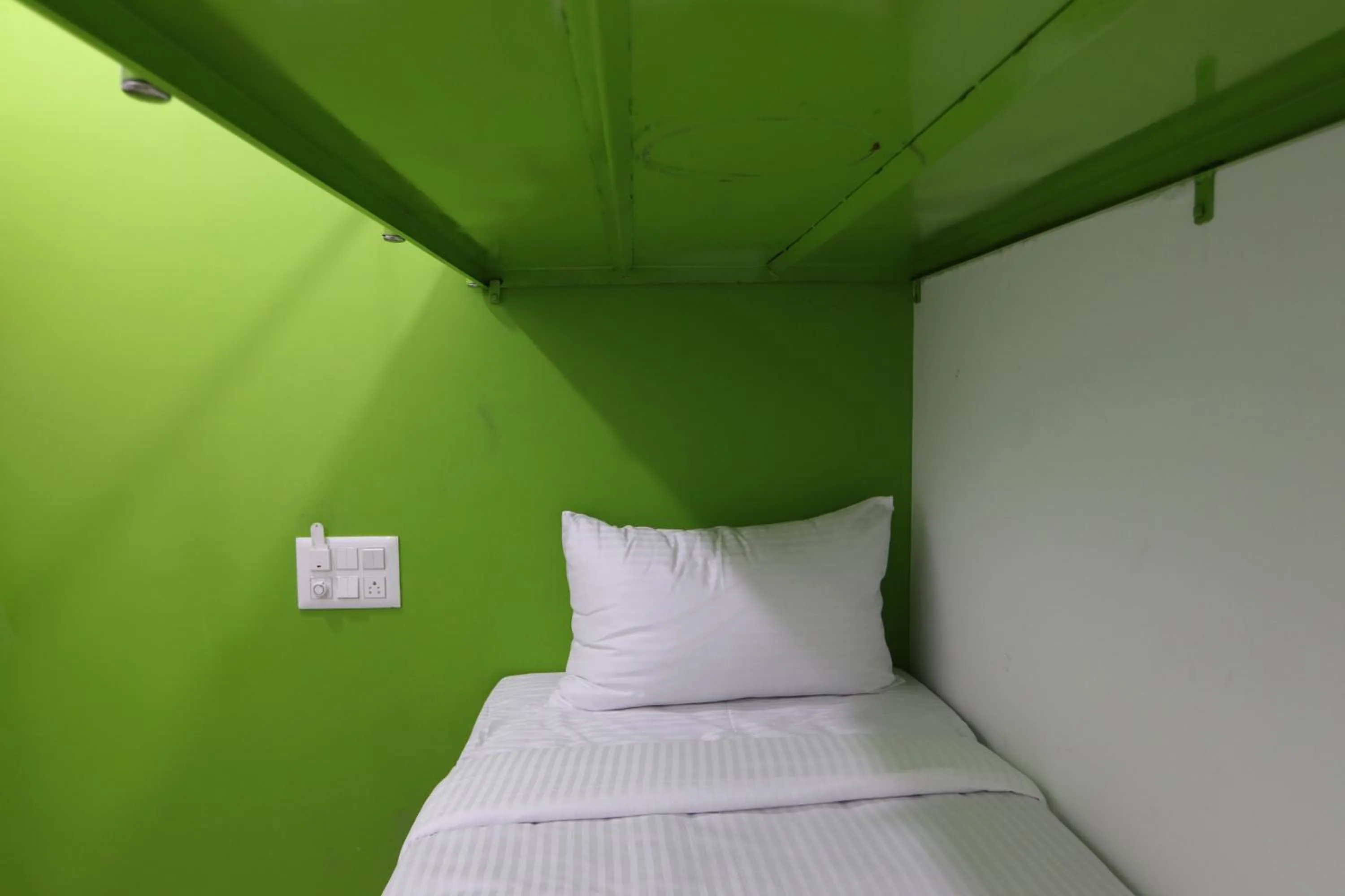 Bed in Athulya Stays