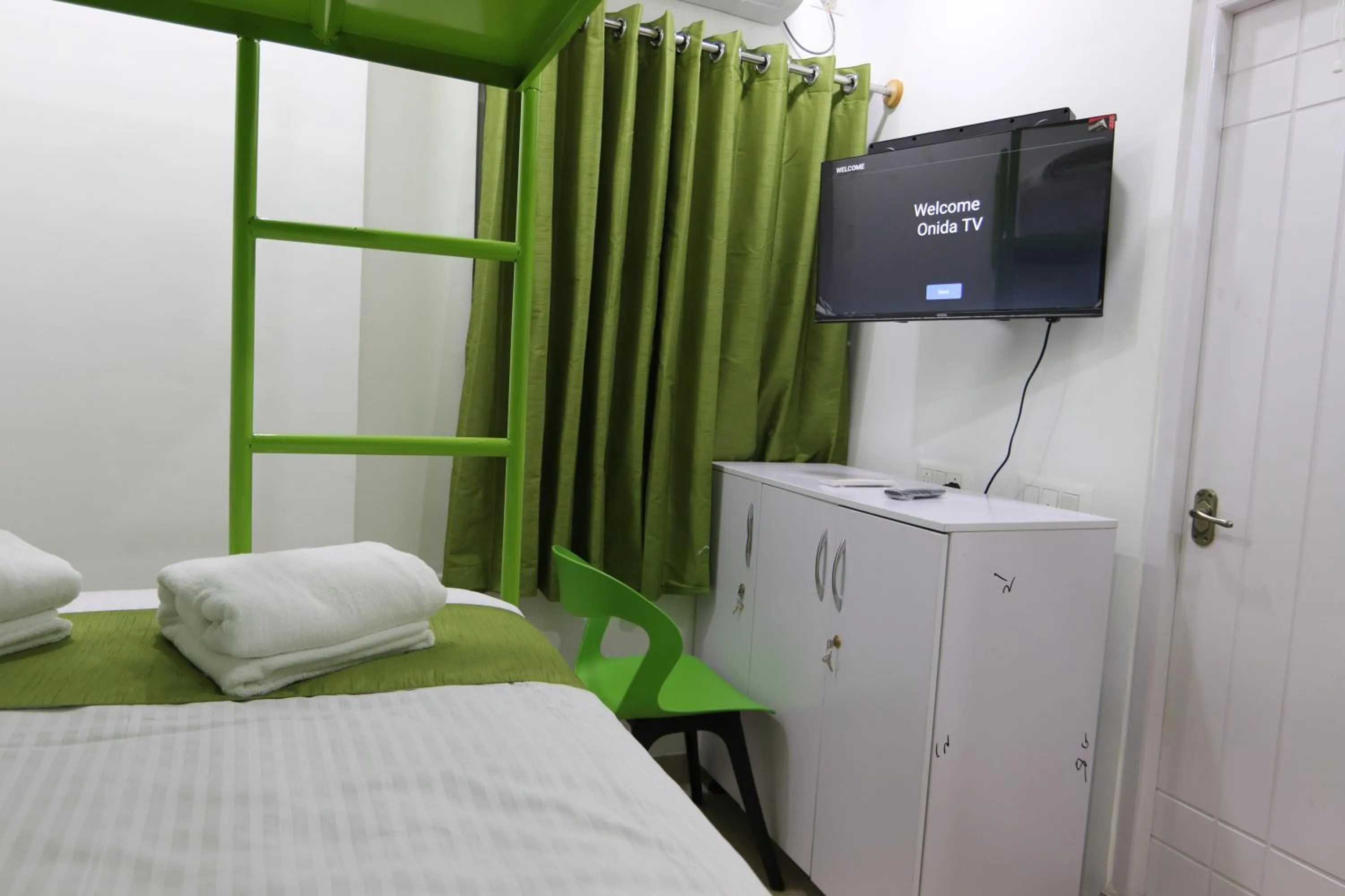 Bed in Athulya Stays