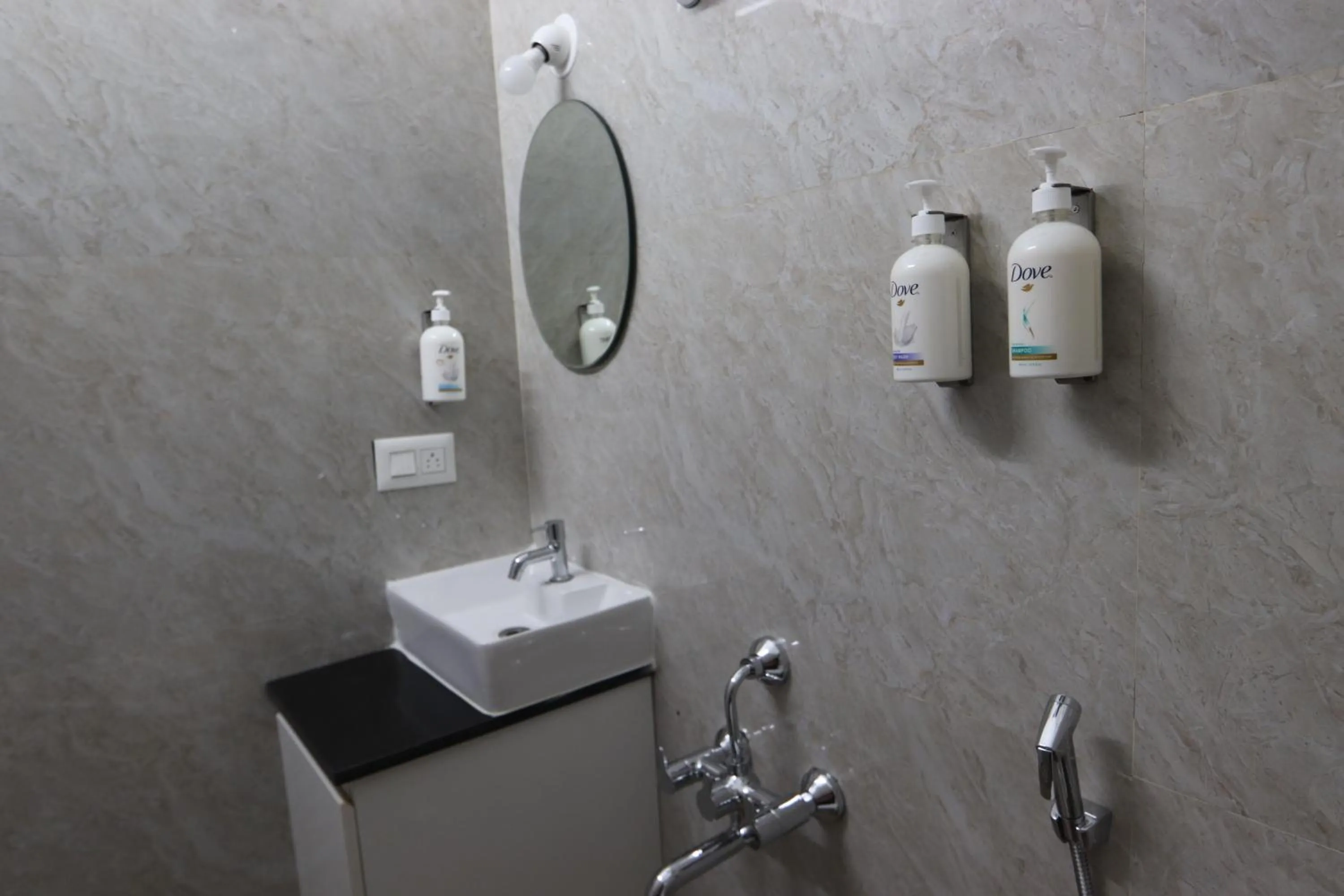 Bathroom in Athulya Stays