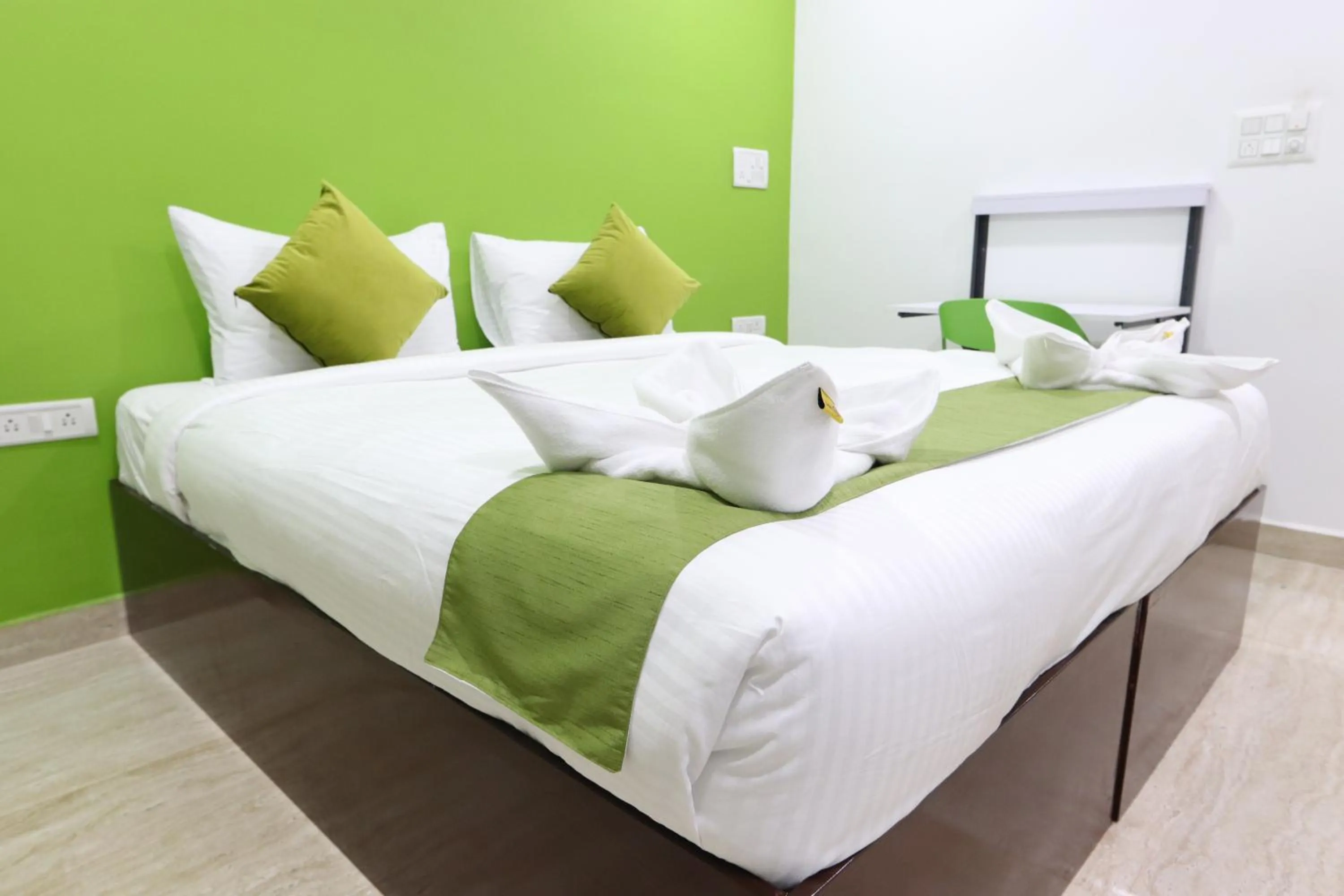 Bed in Athulya Stays