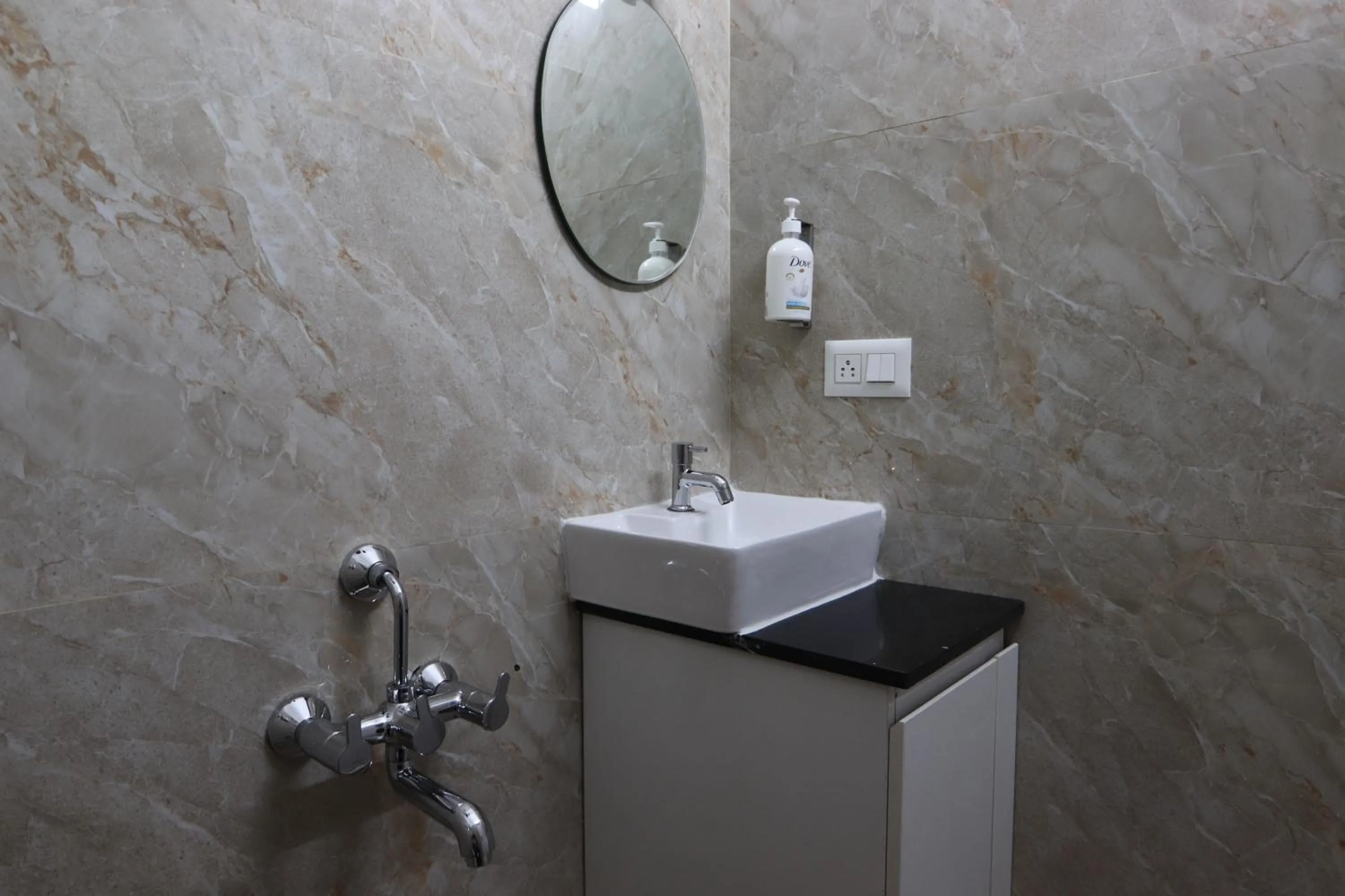 Bathroom in Athulya Stays