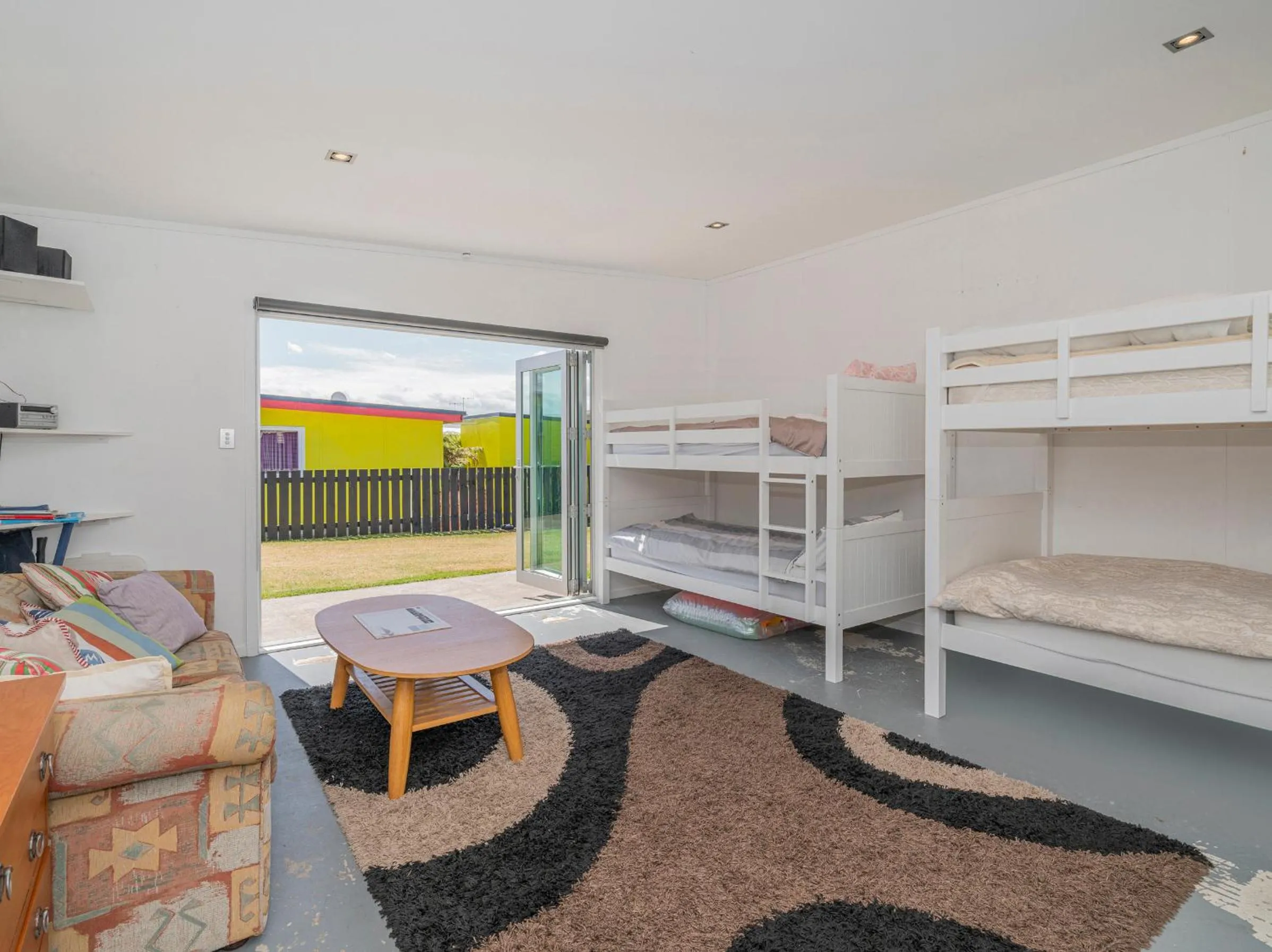 Shower, Bed in Castaway Bach - Whangamata Holiday Home