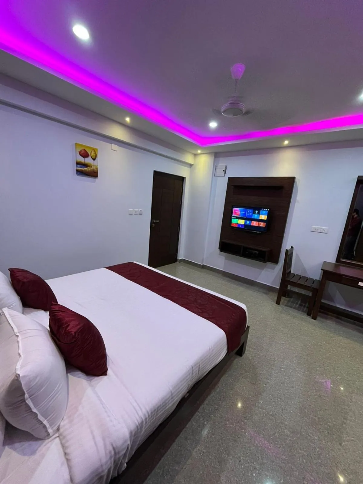 Communal lounge/ TV room, Bed in Coorg ASHOK PALACE