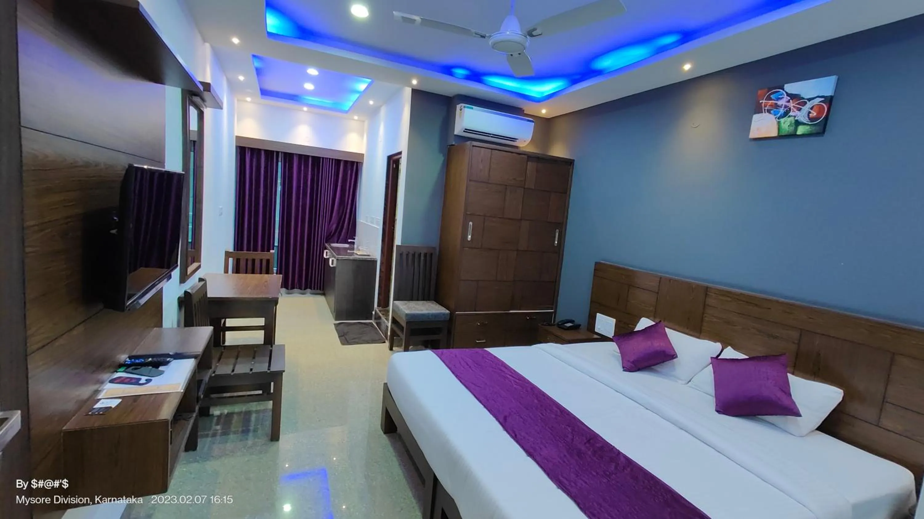 Communal lounge/ TV room, Bed in Coorg ASHOK PALACE