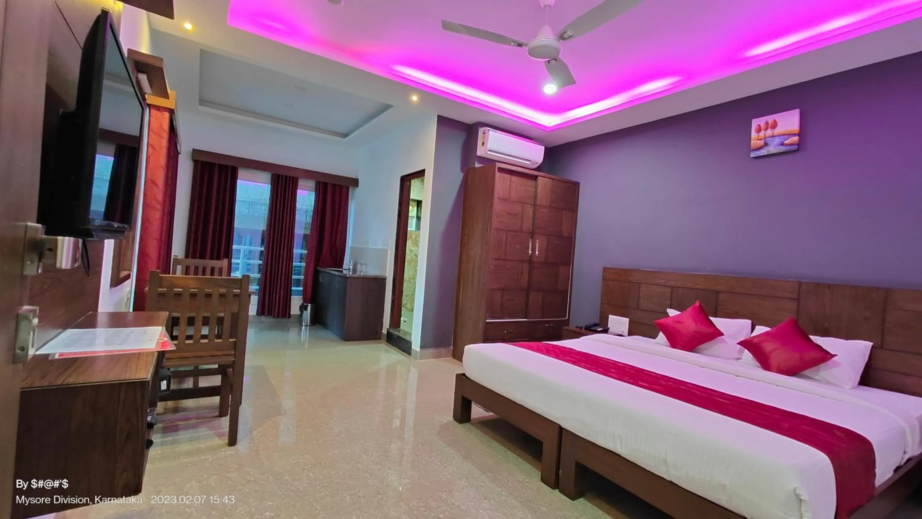 Communal lounge/ TV room, Bed in Coorg ASHOK PALACE